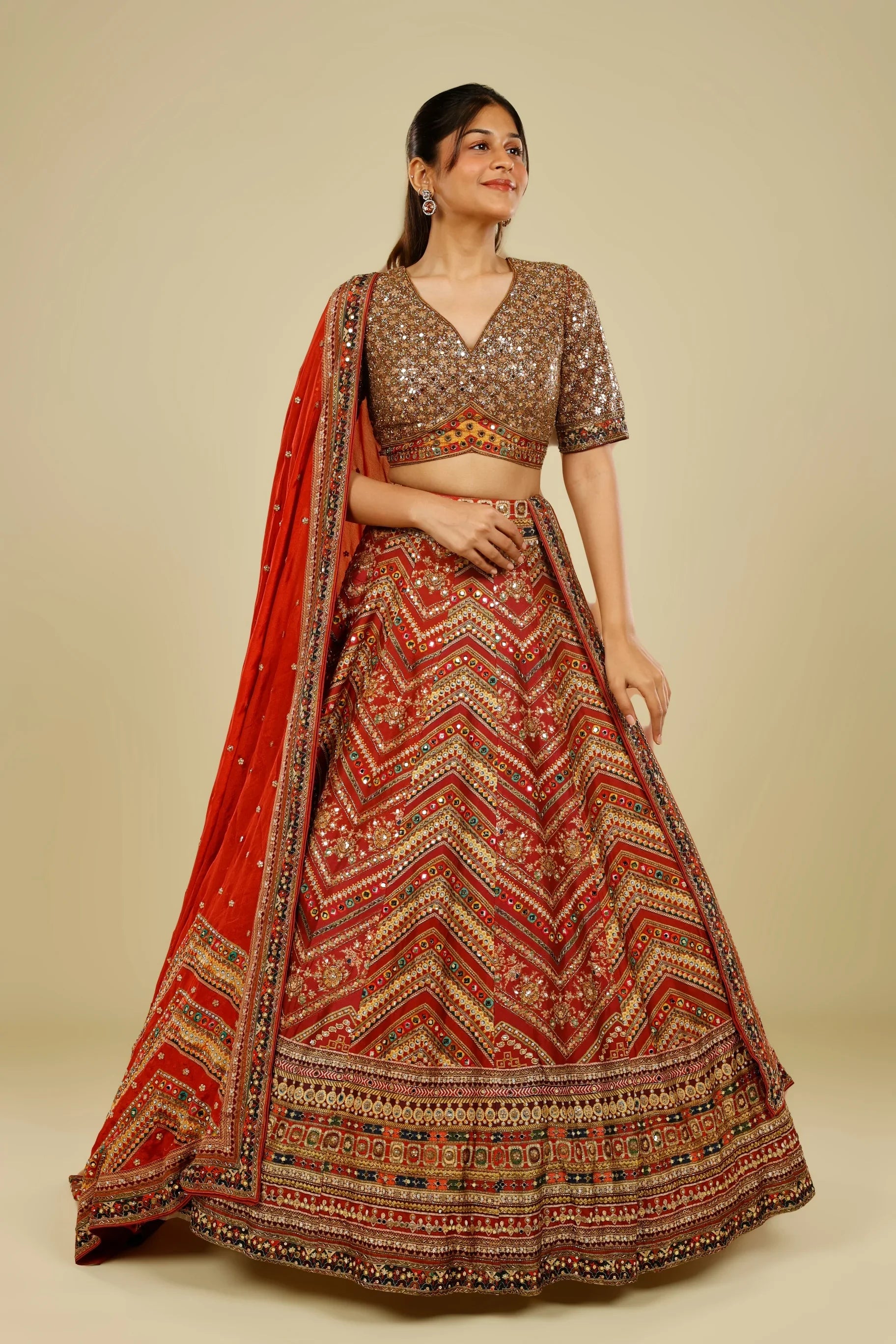 Rust Printed Silk Lehenga Set with Sequin & Kutdana Embroidery - Mokshaa