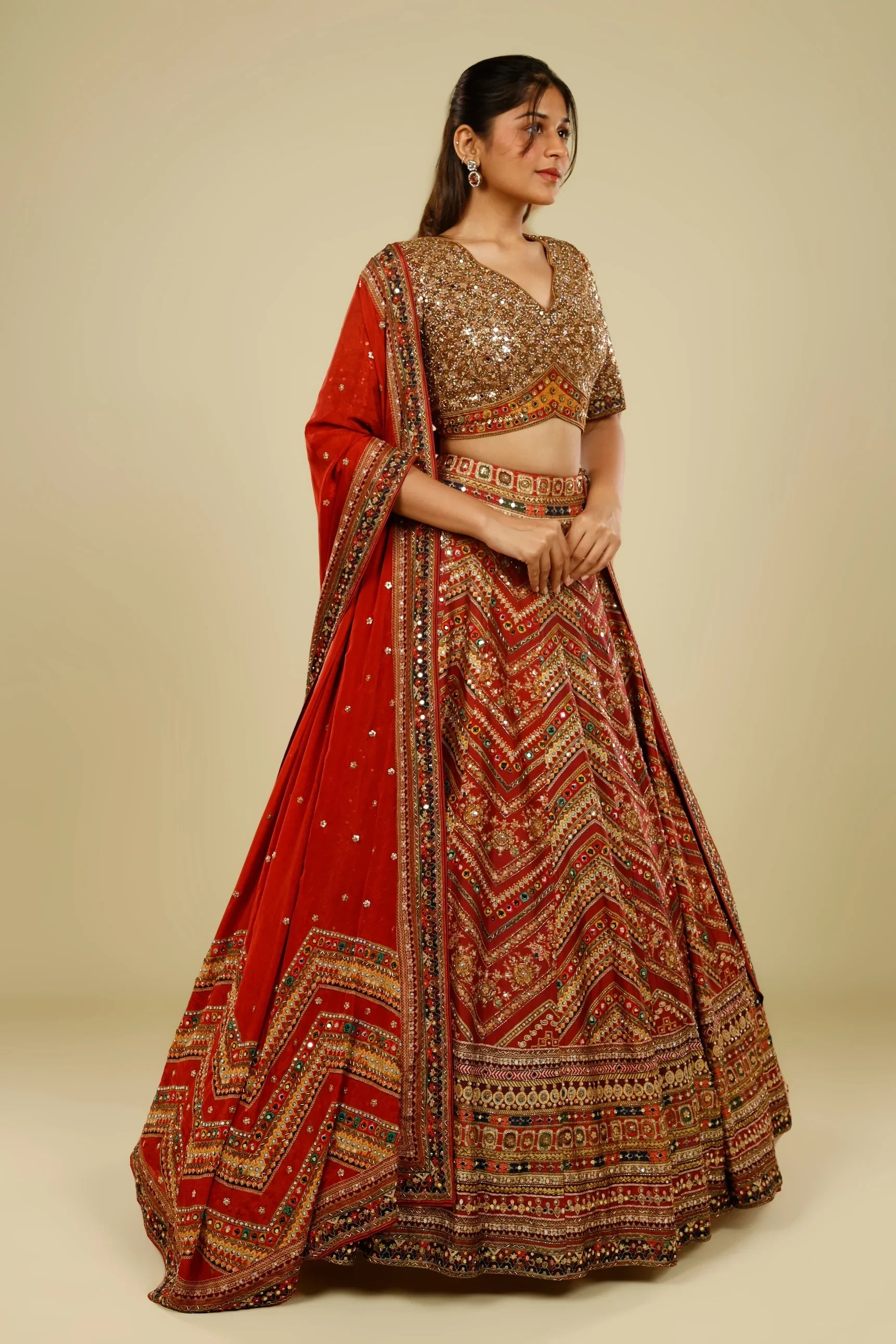 Rust Printed Silk Lehenga Set with Sequin & Kutdana Embroidery - Mokshaa
