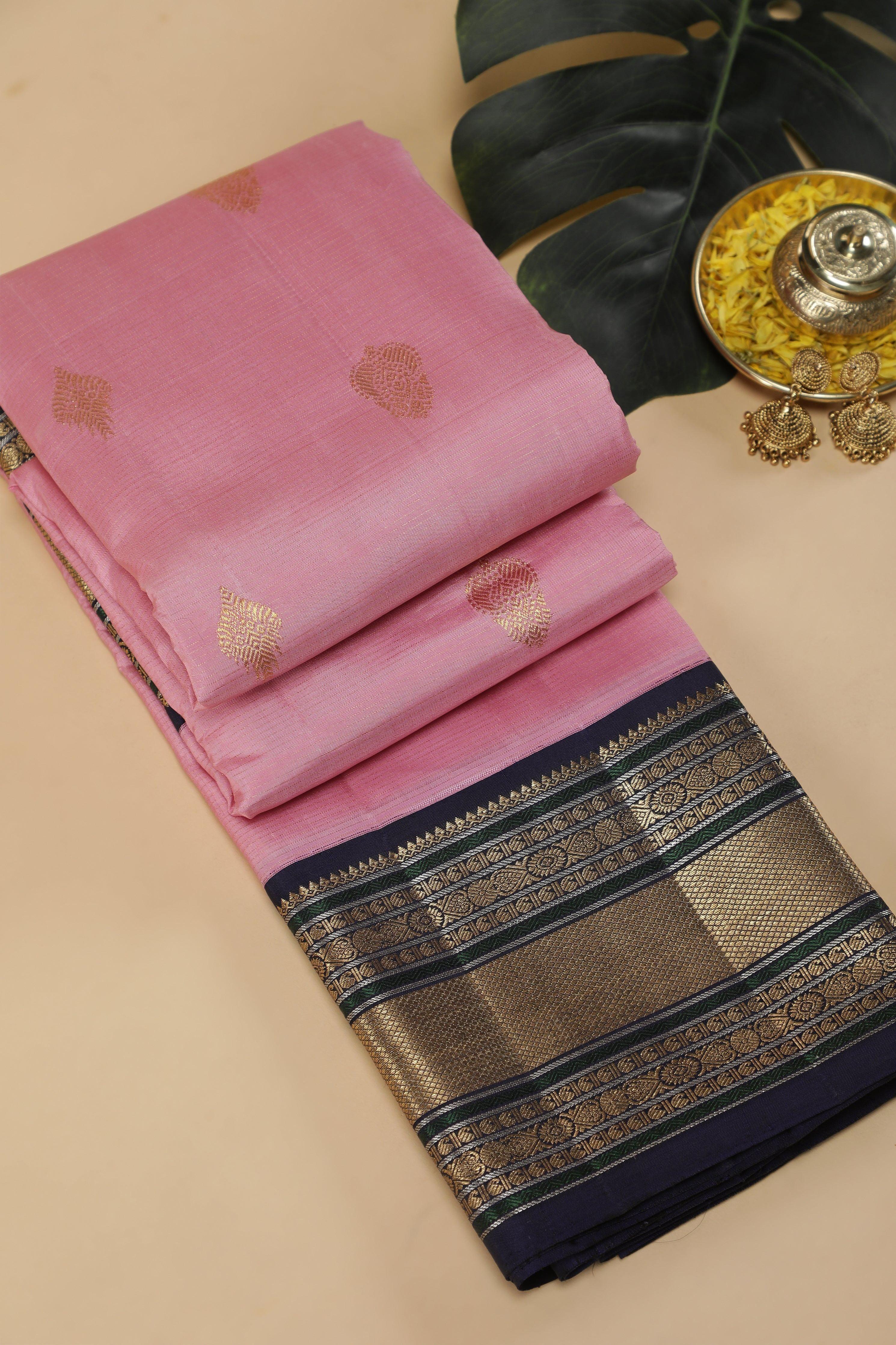 Light Pink Kanchipuram Silk Saree with Zari Motifs and Traditional Border - Mokshaa