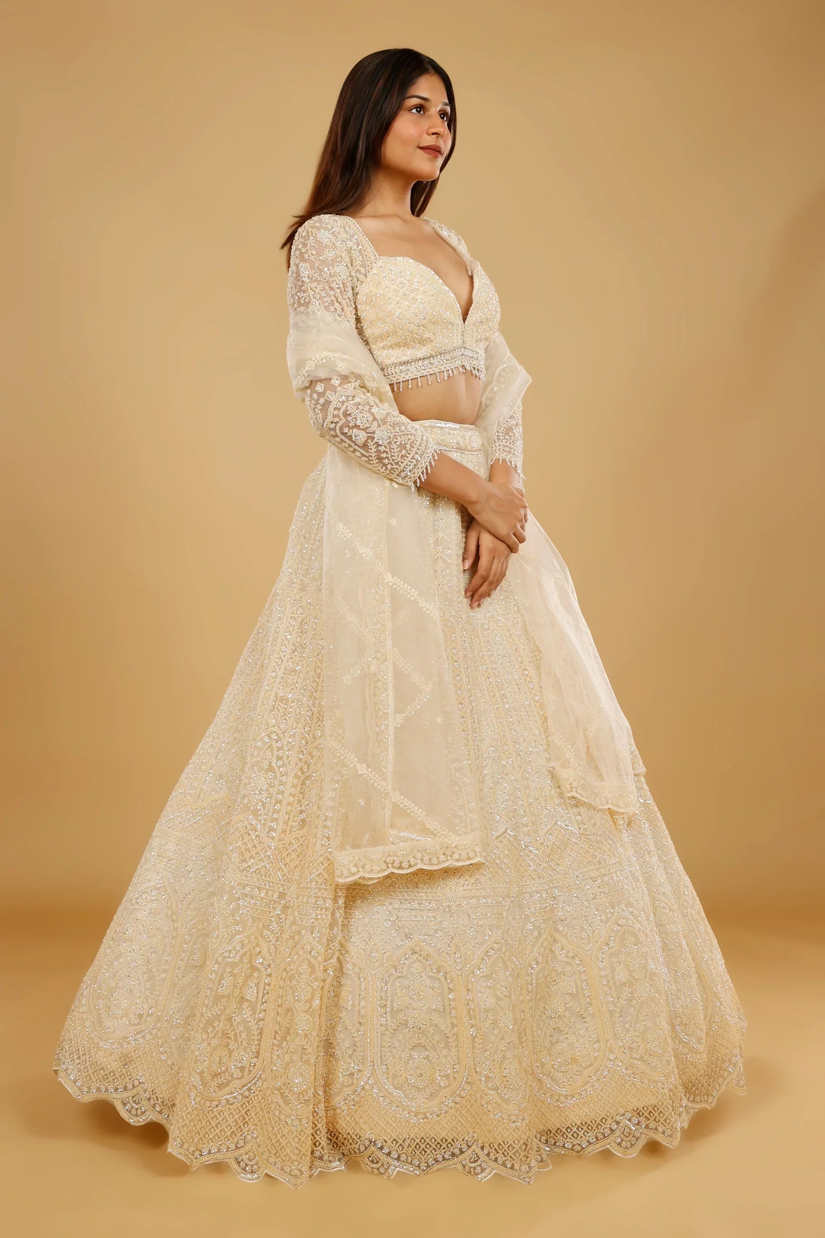 Ivory Gold Net Lehenga Set with Sequin, Cutdana & Pearl Embroidery - Mokshaa