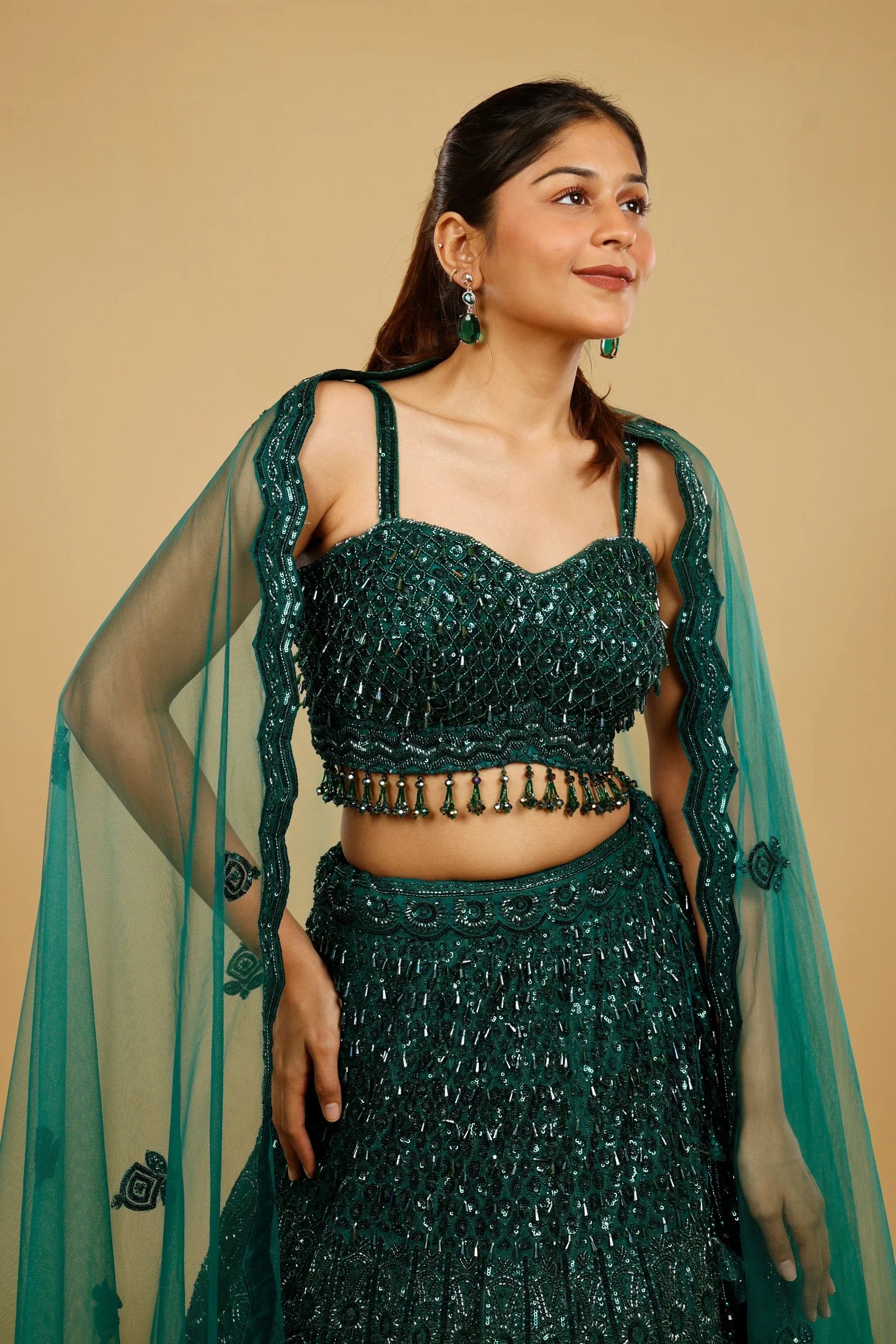 Bottle Green Net Lehenga Set with Sequin, Cutdana & Pearl Embroidery - Mokshaa