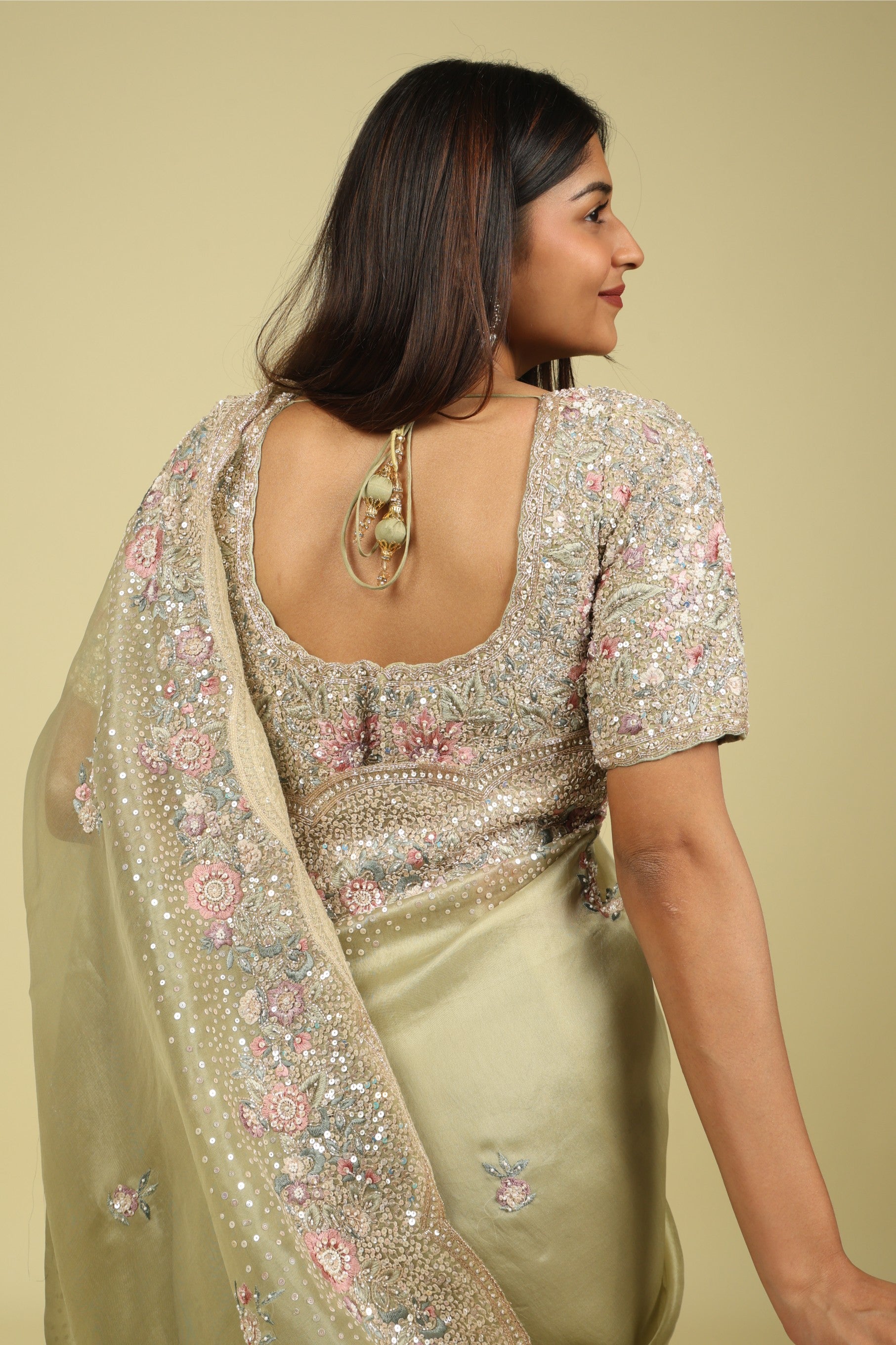 Light Green Organza Saree with Sequin & Thread Embroidery Motifs - Mokshaa