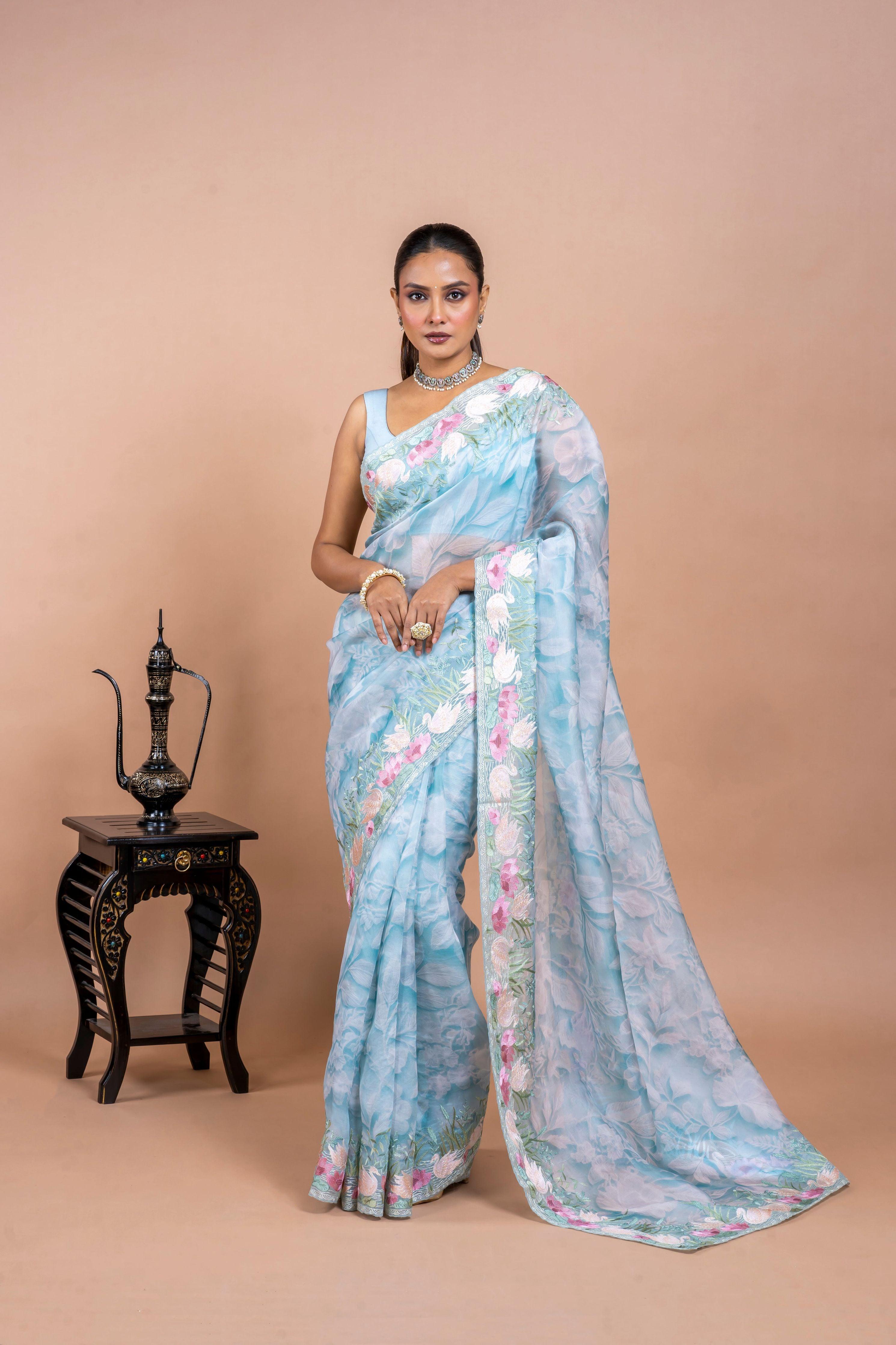 Sea Blue Organza Saree with Printed Body and Zari Border - Mokshaa