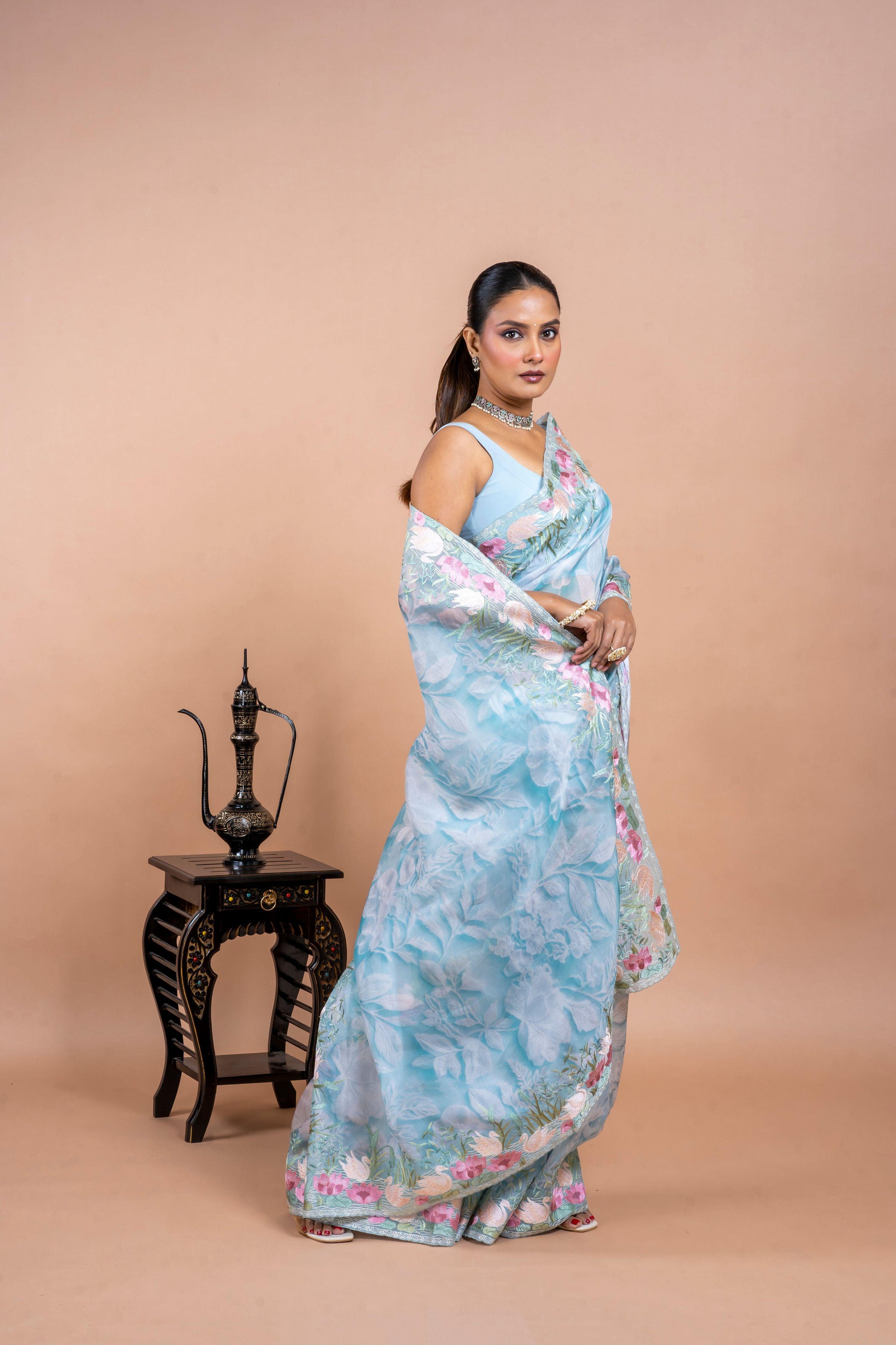 Sea Blue Organza Saree with Printed Body and Zari Border - Mokshaa