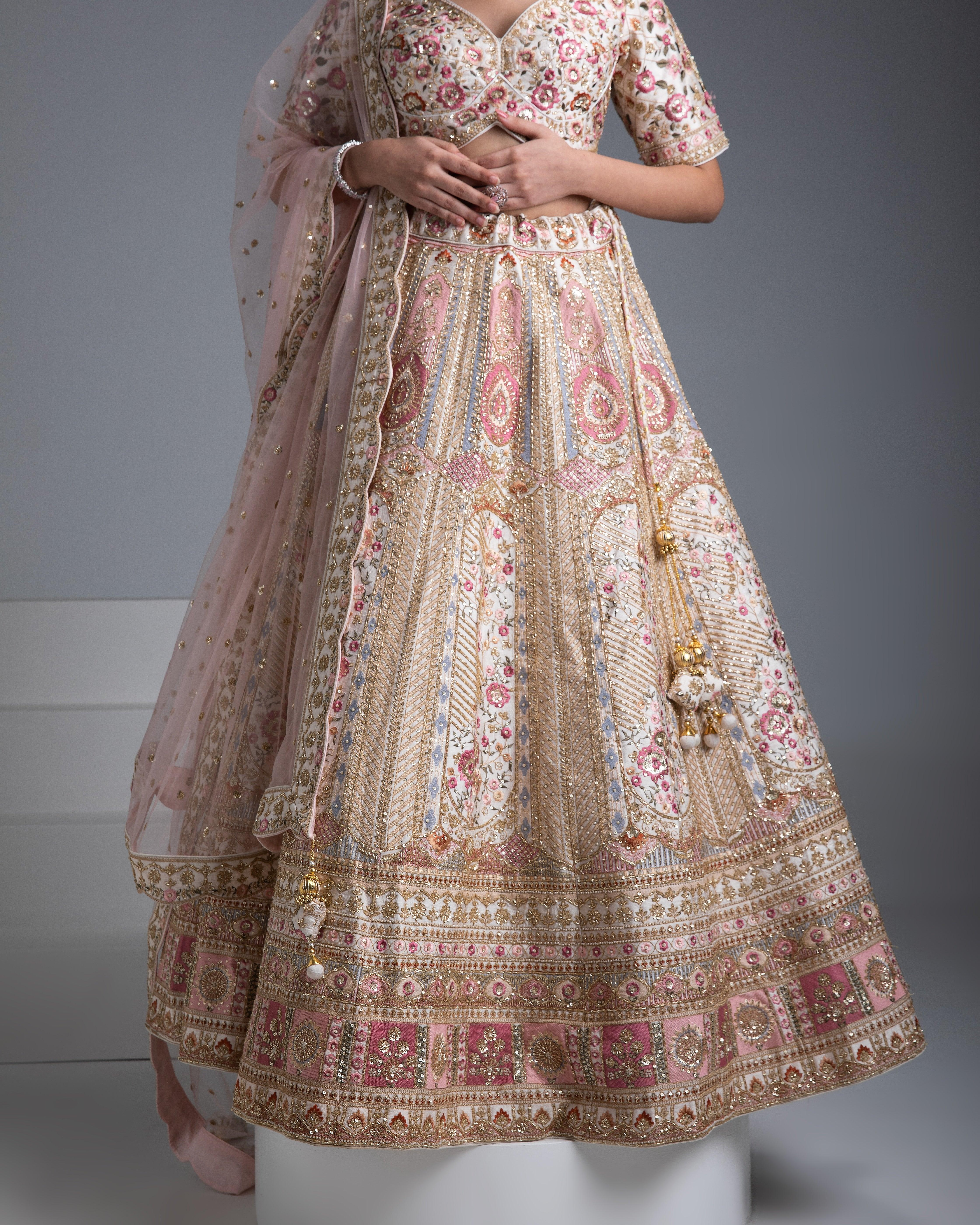 Beige Silk Lehenga With Gold Accents And Blush Pink Dupatta - Mokshaa