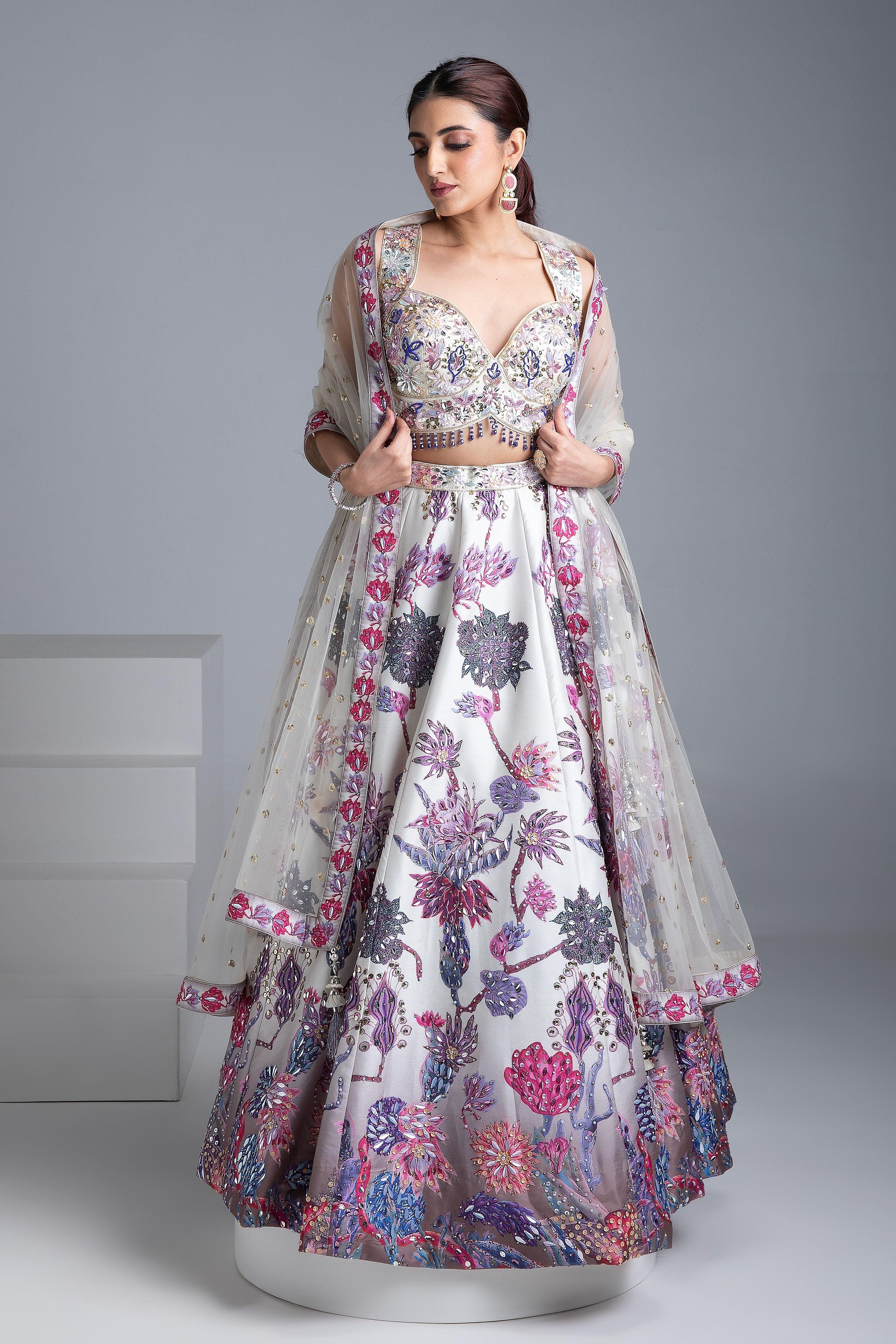 Ivory Silk Lehenga With Multicolor Floral Embroidery And Net Dupatta - Mokshaa