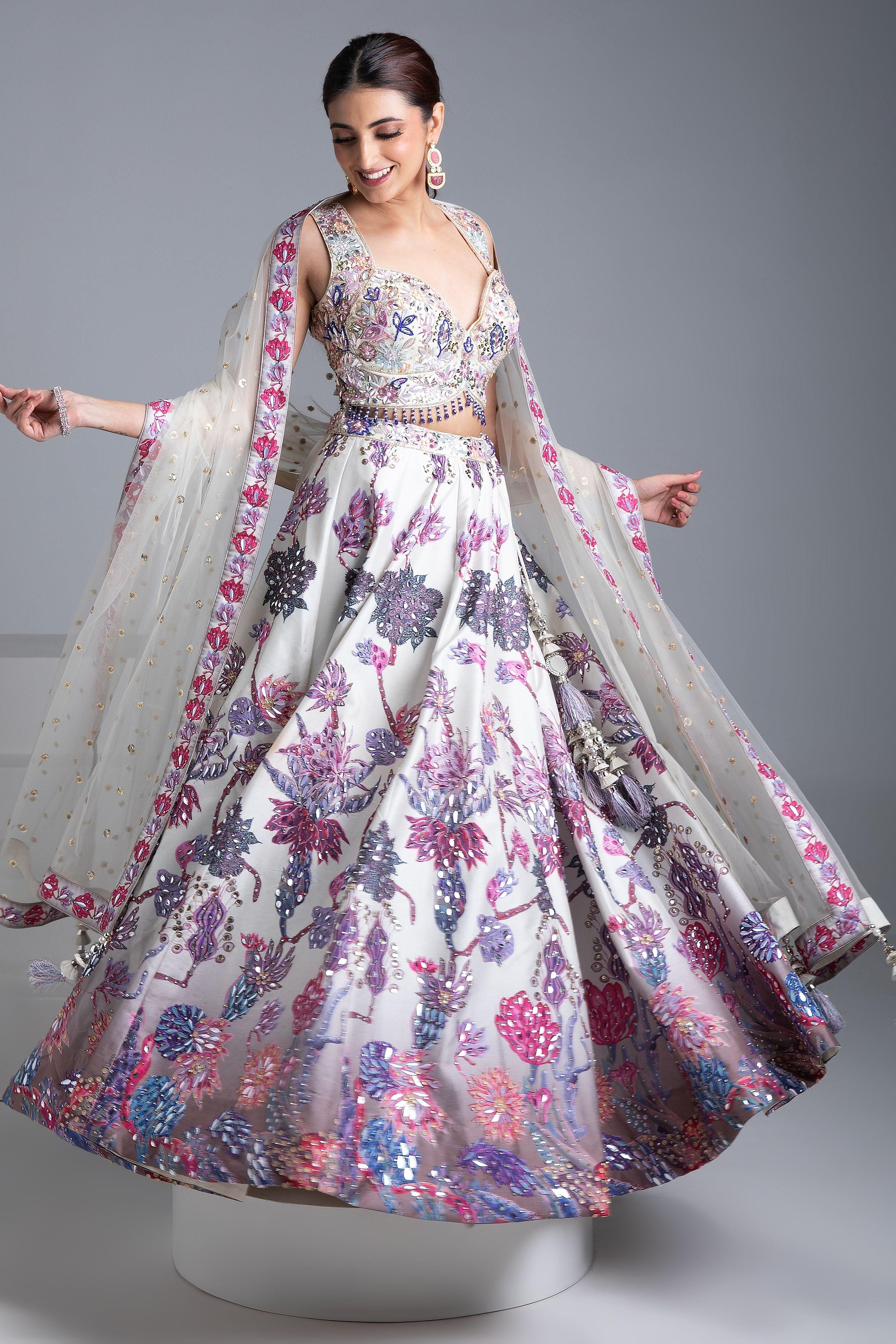 Ivory Silk Lehenga With Multicolor Floral Embroidery And Net Dupatta - Mokshaa