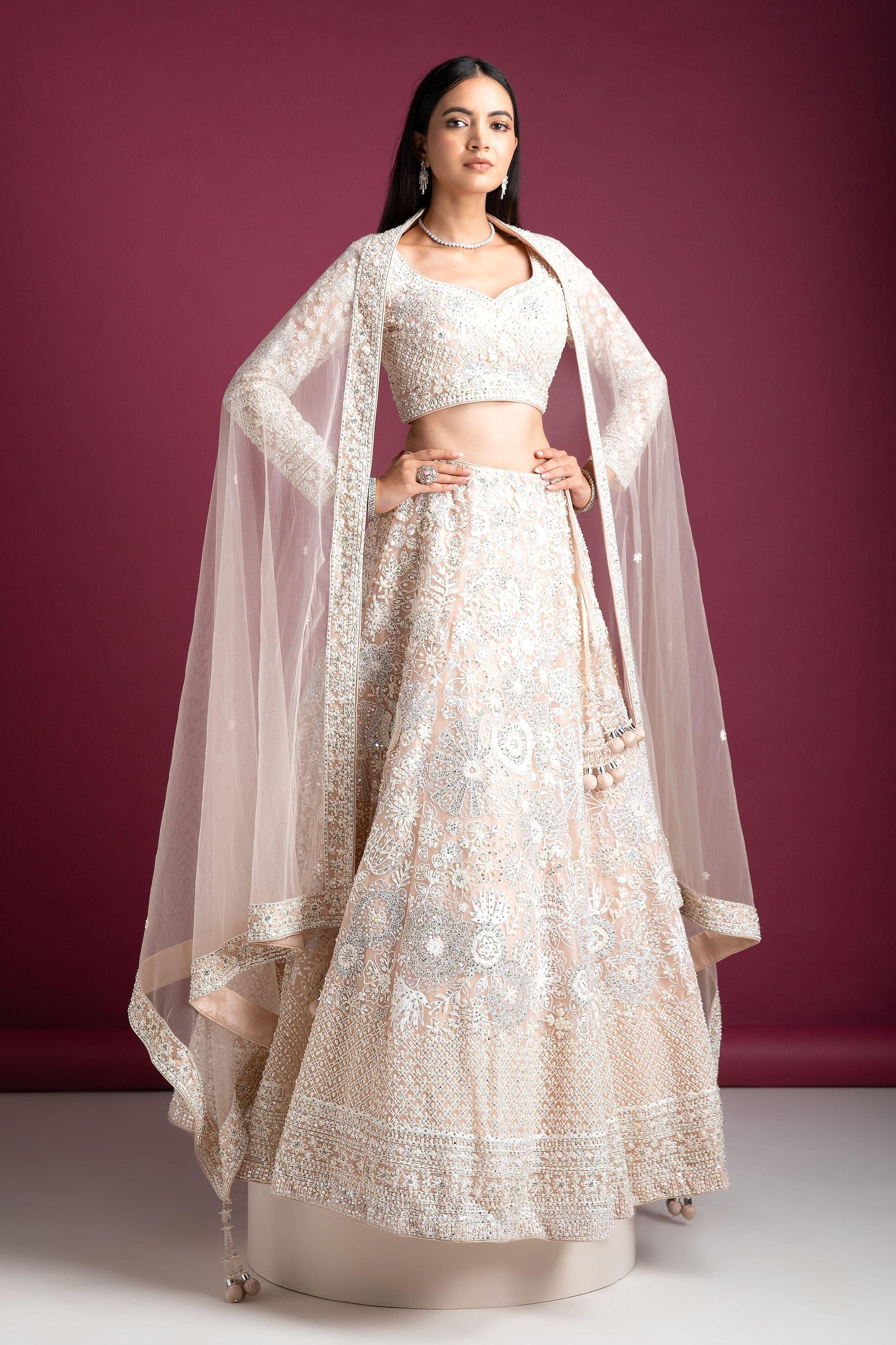 Peach Embellished Bridal Lehenga With Intricate Threadwork - Mokshaa