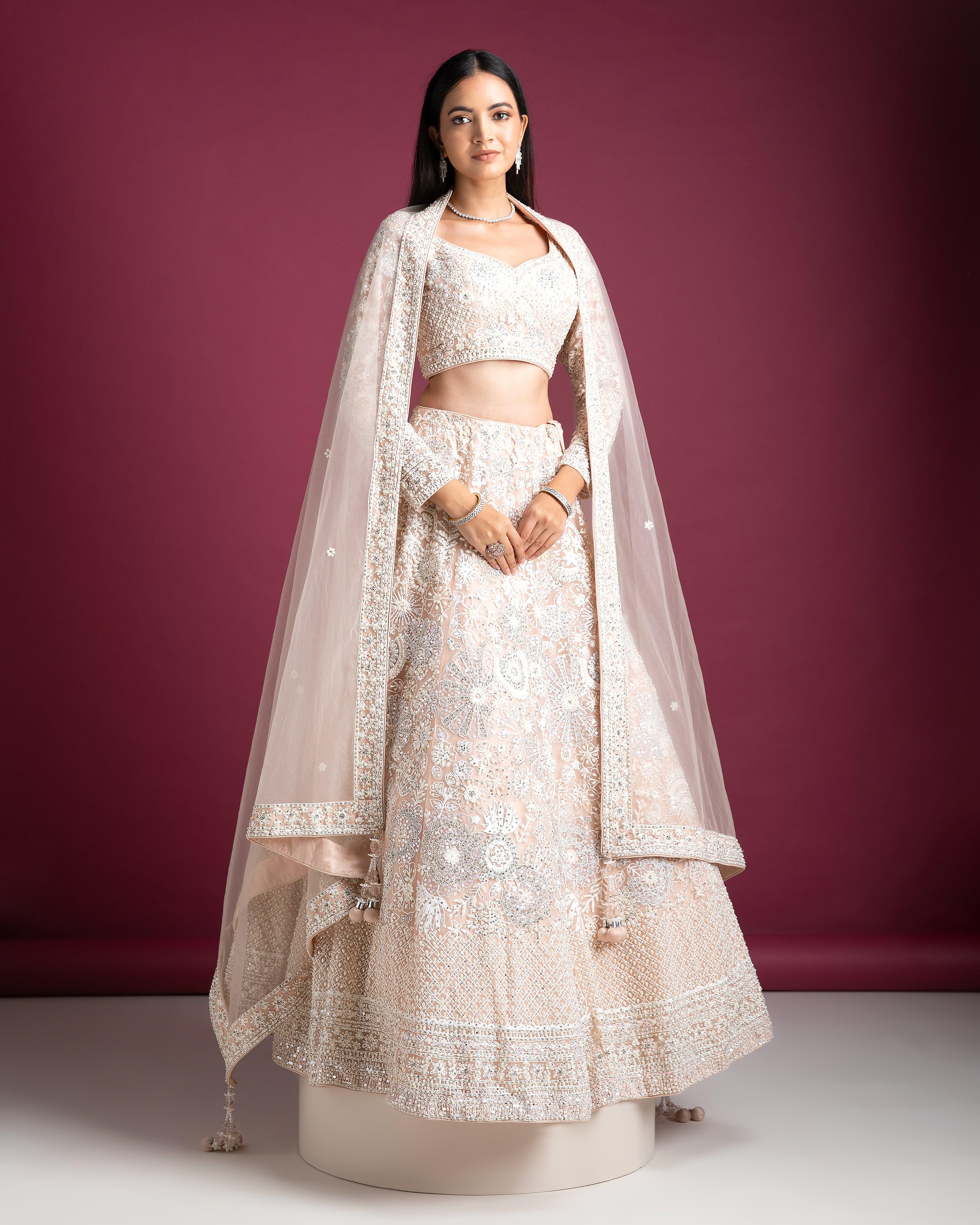 Peach Embellished Bridal Lehenga With Intricate Threadwork - Mokshaa