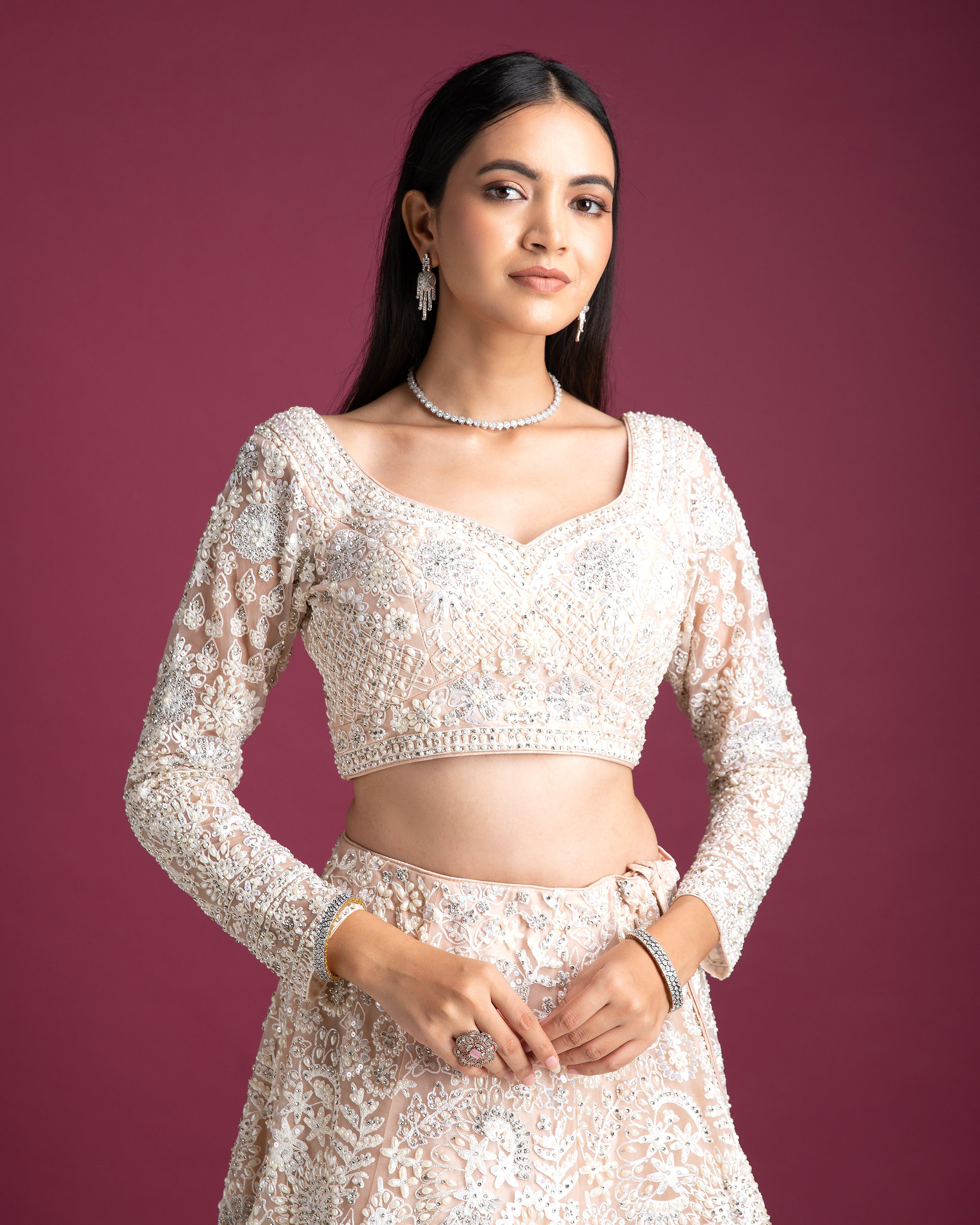 Peach Embellished Bridal Lehenga With Intricate Threadwork - Mokshaa