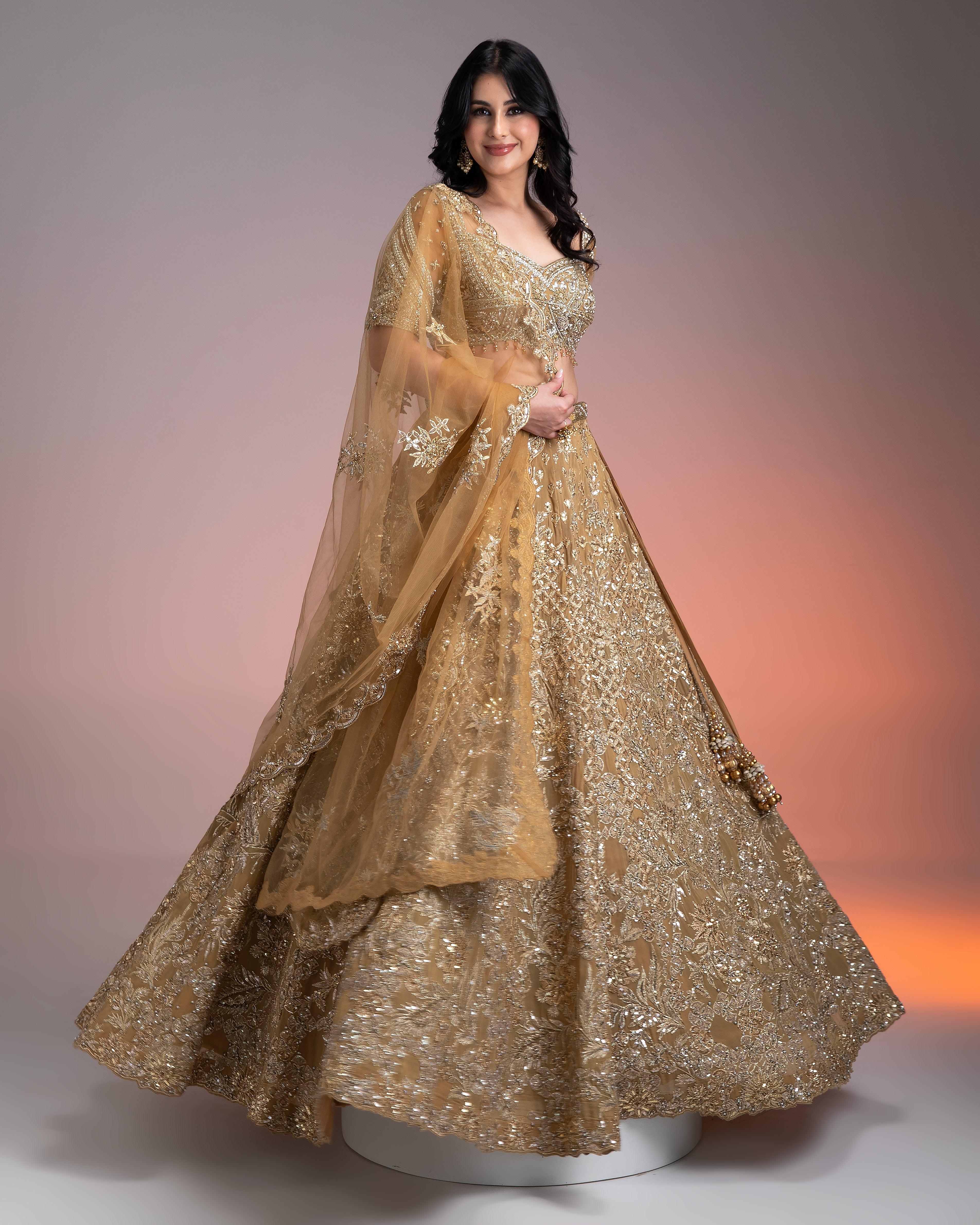 Golden Net Lehenga Set With Intricate Sequin And Thread Embroidery - Mokshaa