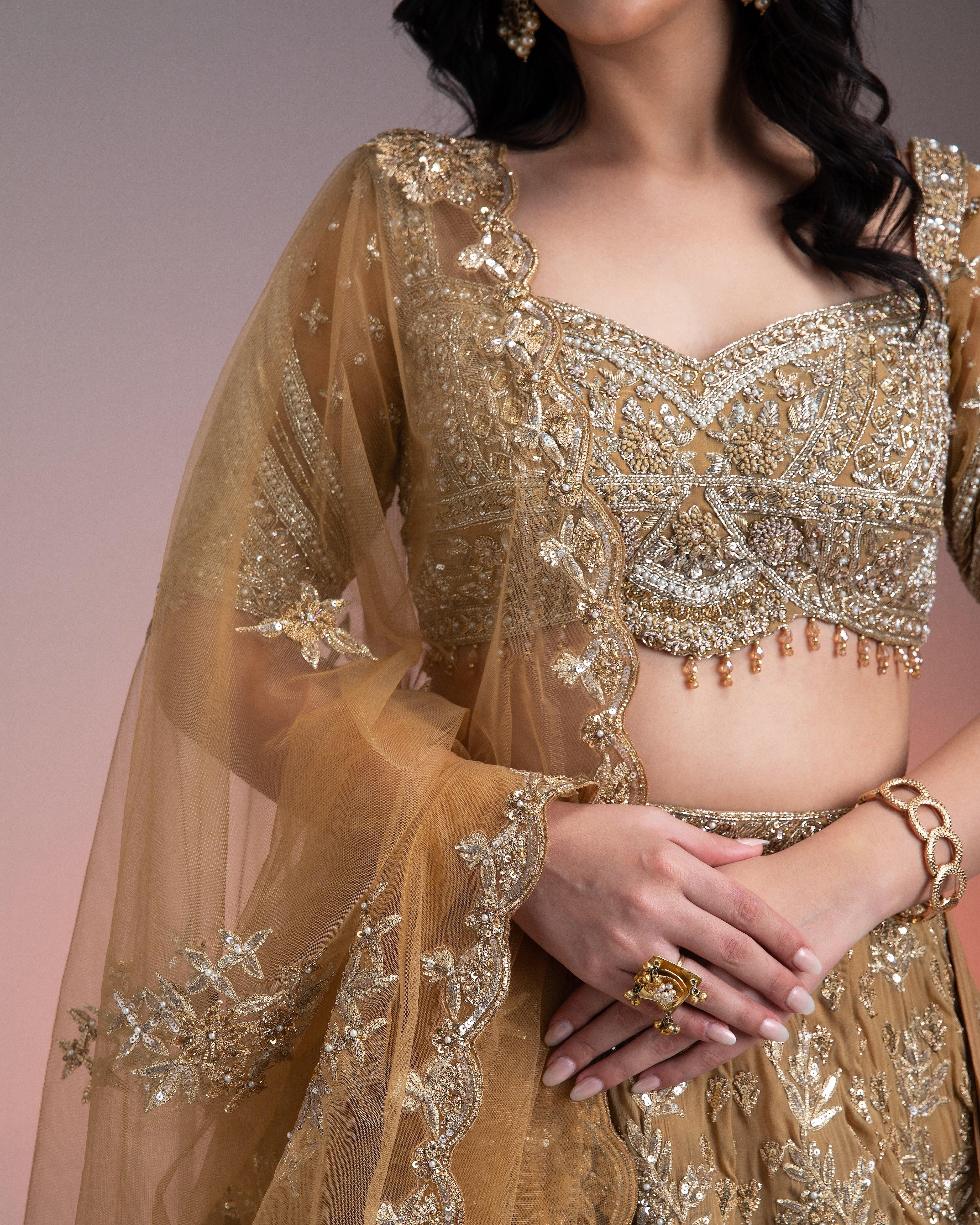 Golden Net Lehenga Set With Intricate Sequin And Thread Embroidery - Mokshaa
