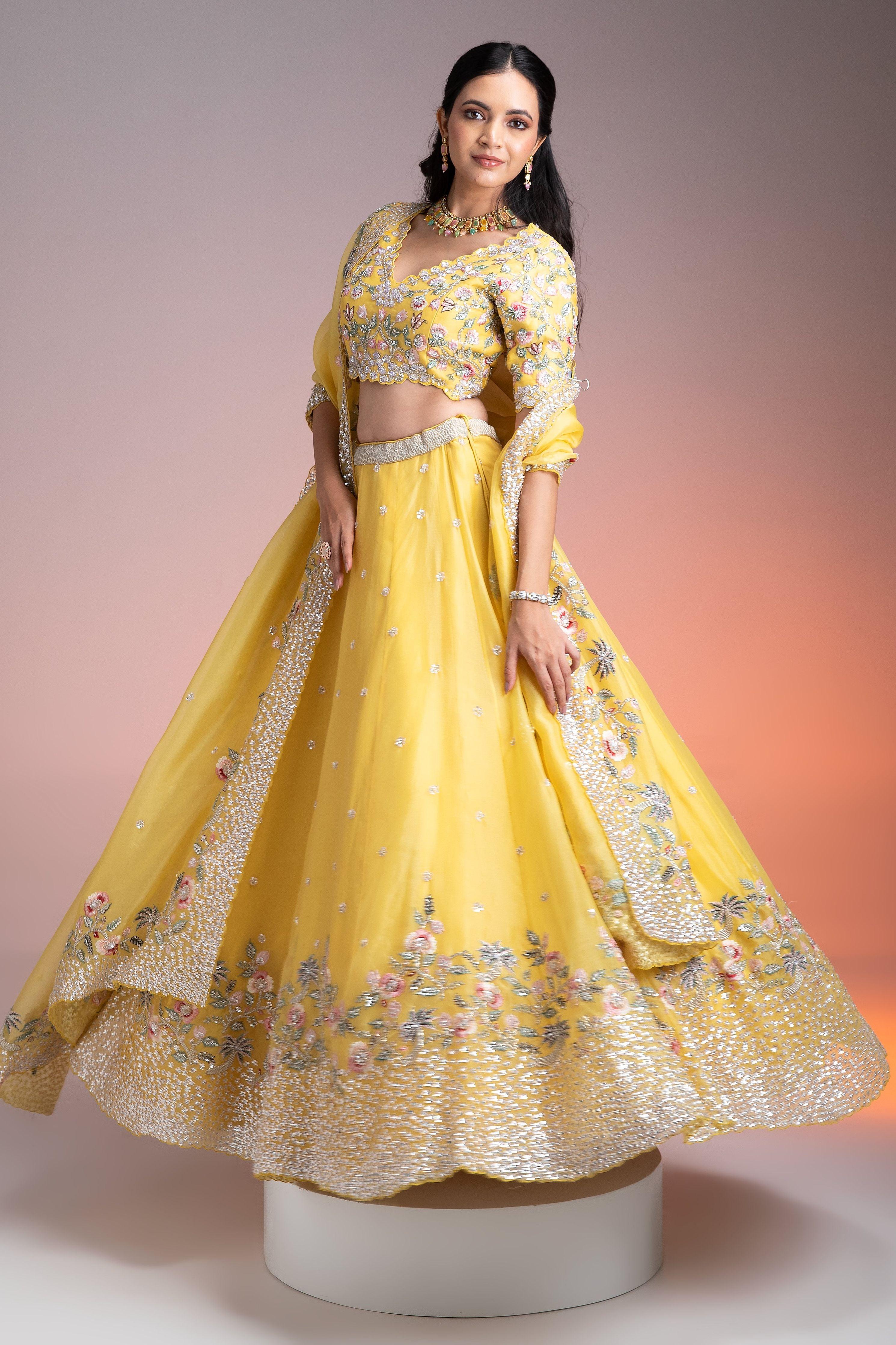 Vibrant Yellow Organza Lehenga With Multicolor Floral Threadwork And Sequins - Mokshaa