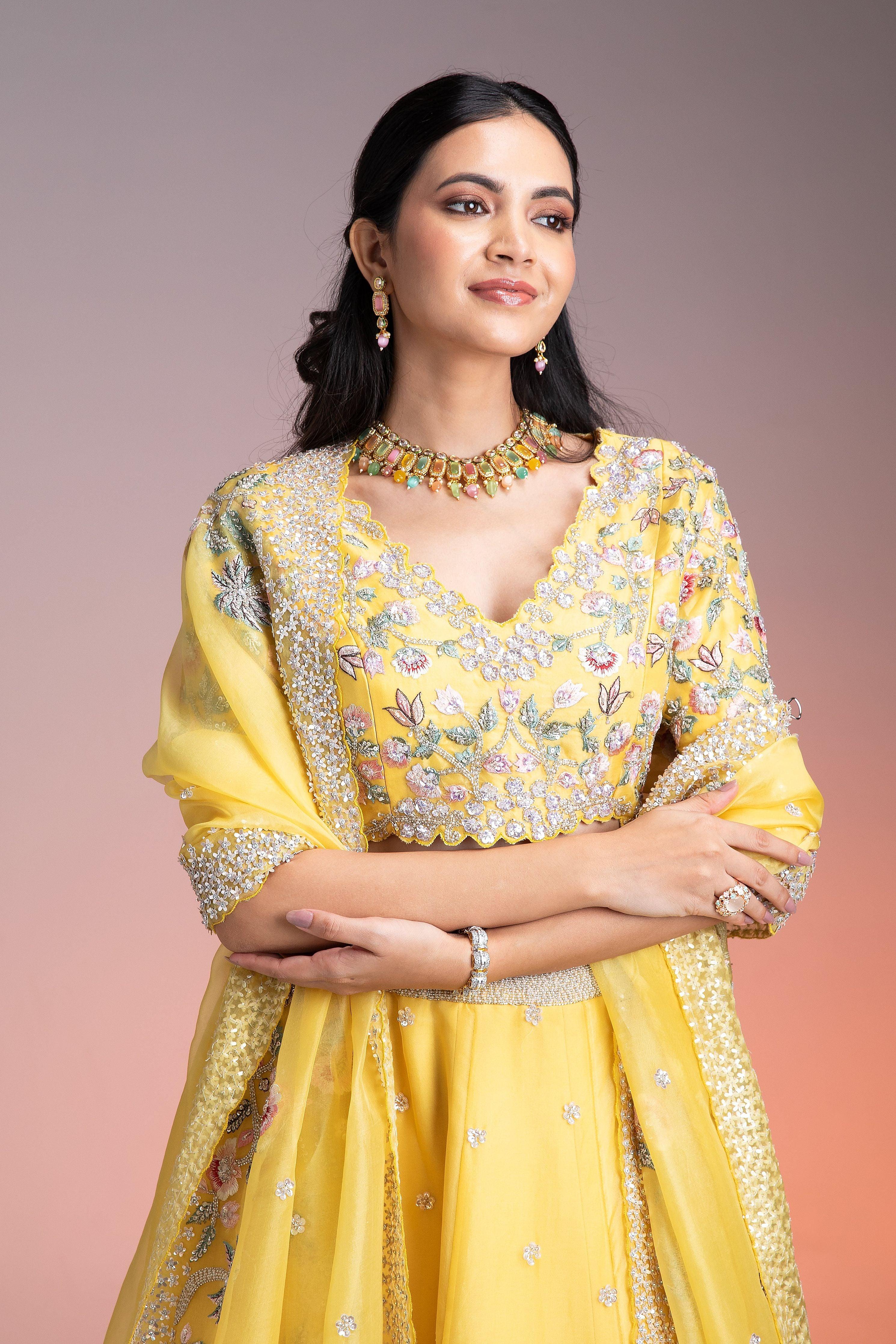 Vibrant Yellow Organza Lehenga With Multicolor Floral Threadwork And Sequins - Mokshaa