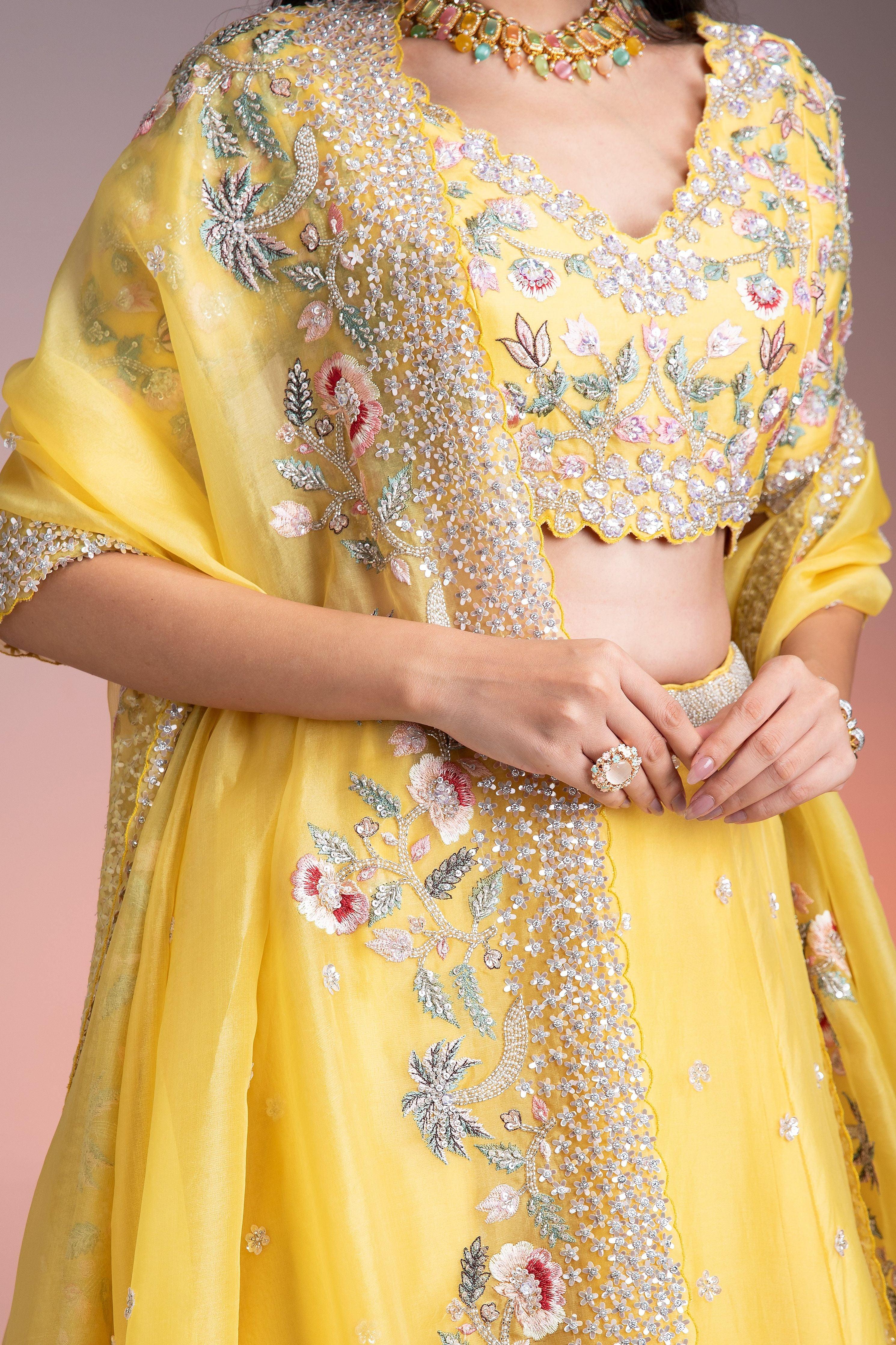 Vibrant Yellow Organza Lehenga With Multicolor Floral Threadwork And Sequins - Mokshaa