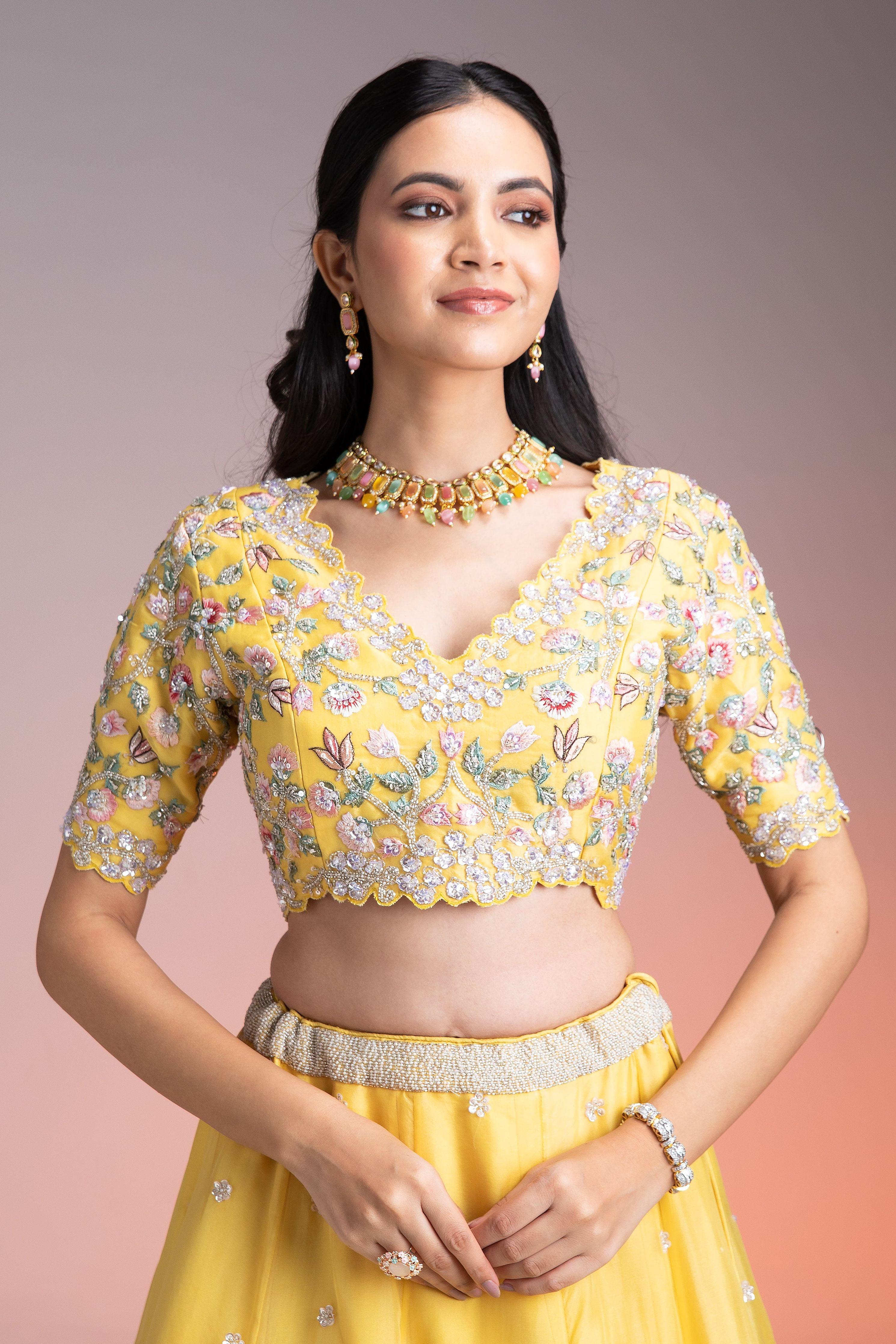Vibrant Yellow Organza Lehenga With Multicolor Floral Threadwork And Sequins - Mokshaa