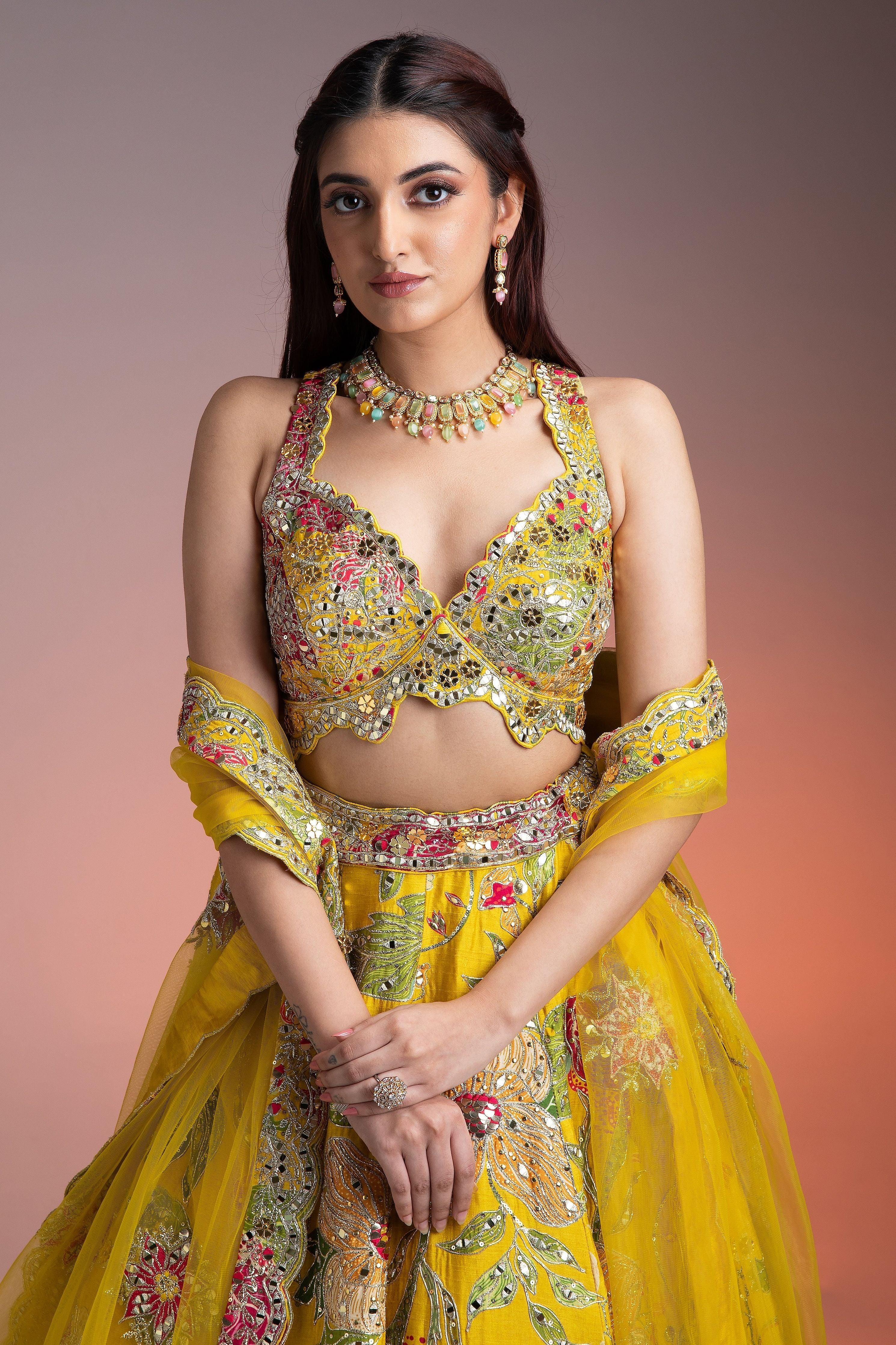 Bright Yellow Silk Lehenga With Multicolor Floral Print And Mirror Embellishments - Mokshaa
