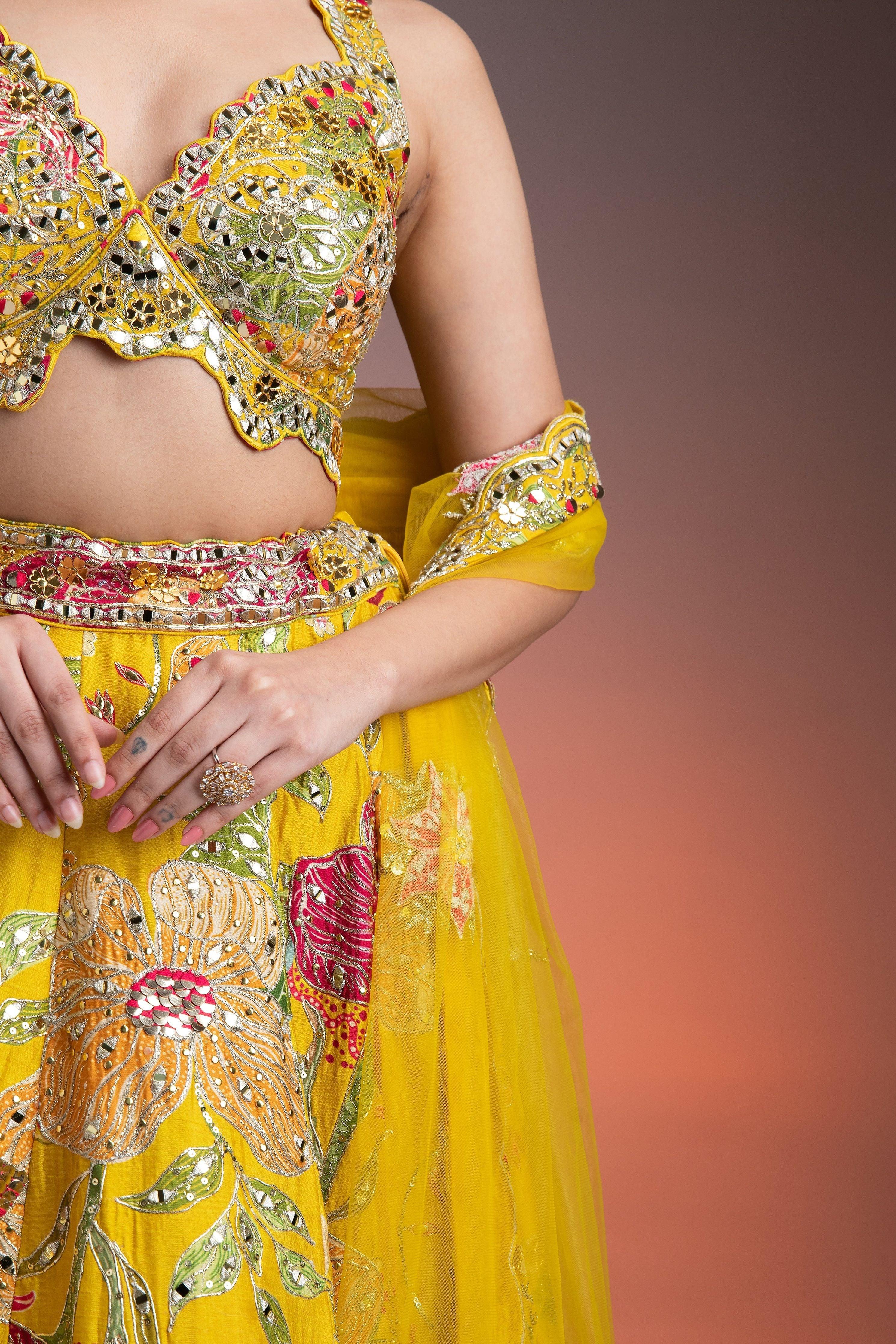 Bright Yellow Silk Lehenga With Multicolor Floral Print And Mirror Embellishments - Mokshaa