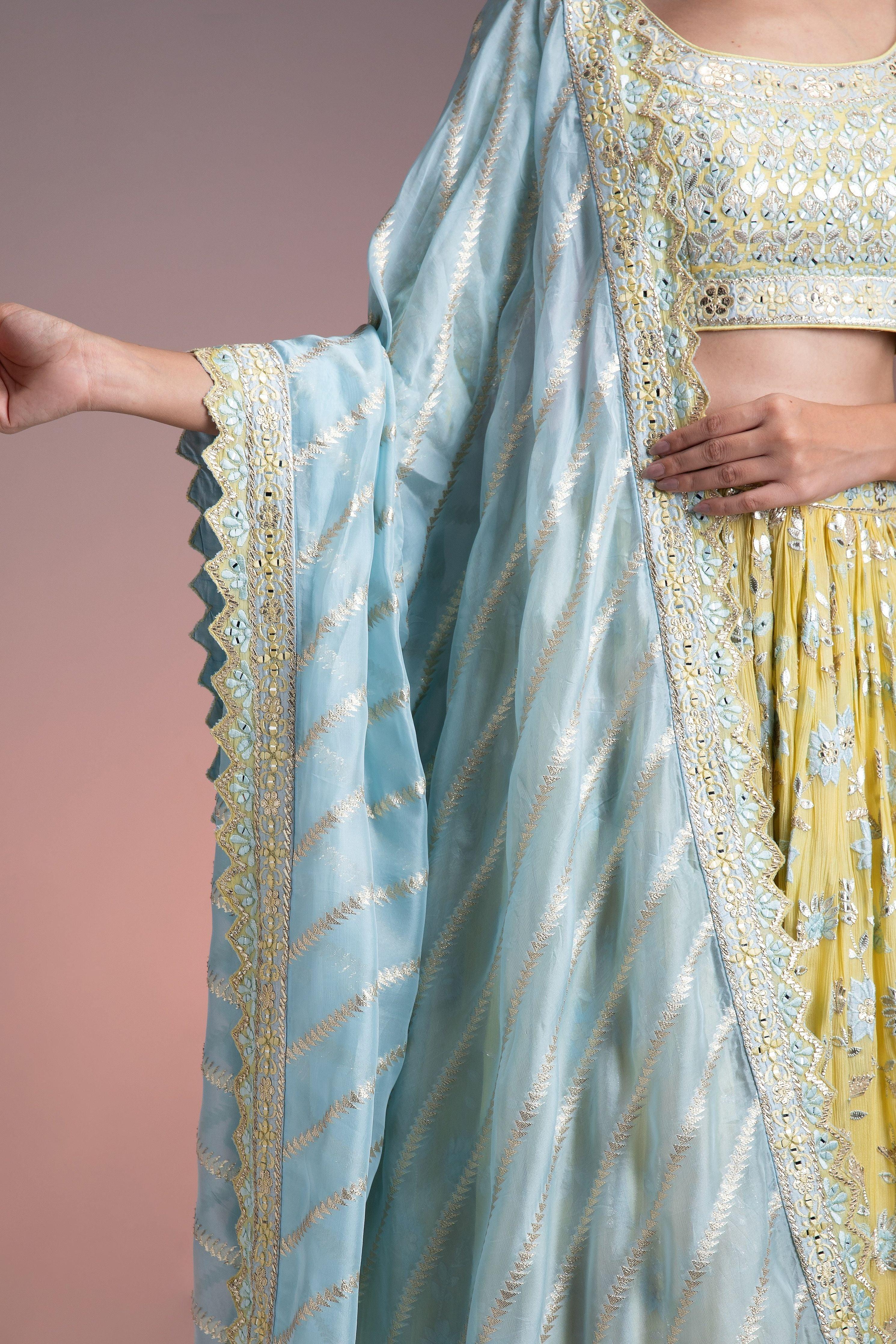 Pastel Yellow Crushed Georgette Lehenga Set With Mirror Embroidery - Mokshaa
