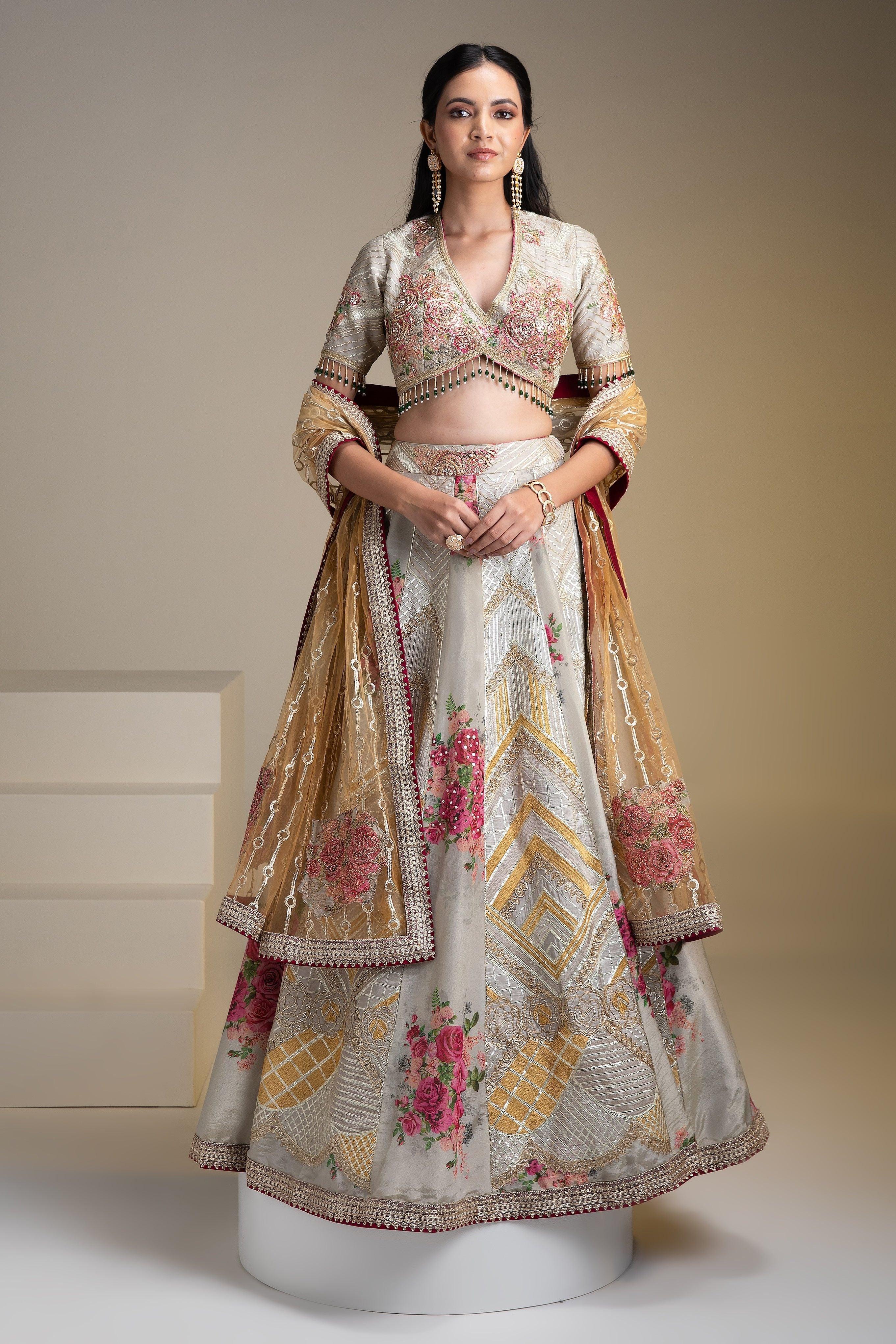 Opulent Silver Tissue Lehenga Set With Vibrant Floral Print And Zari Work - Mokshaa
