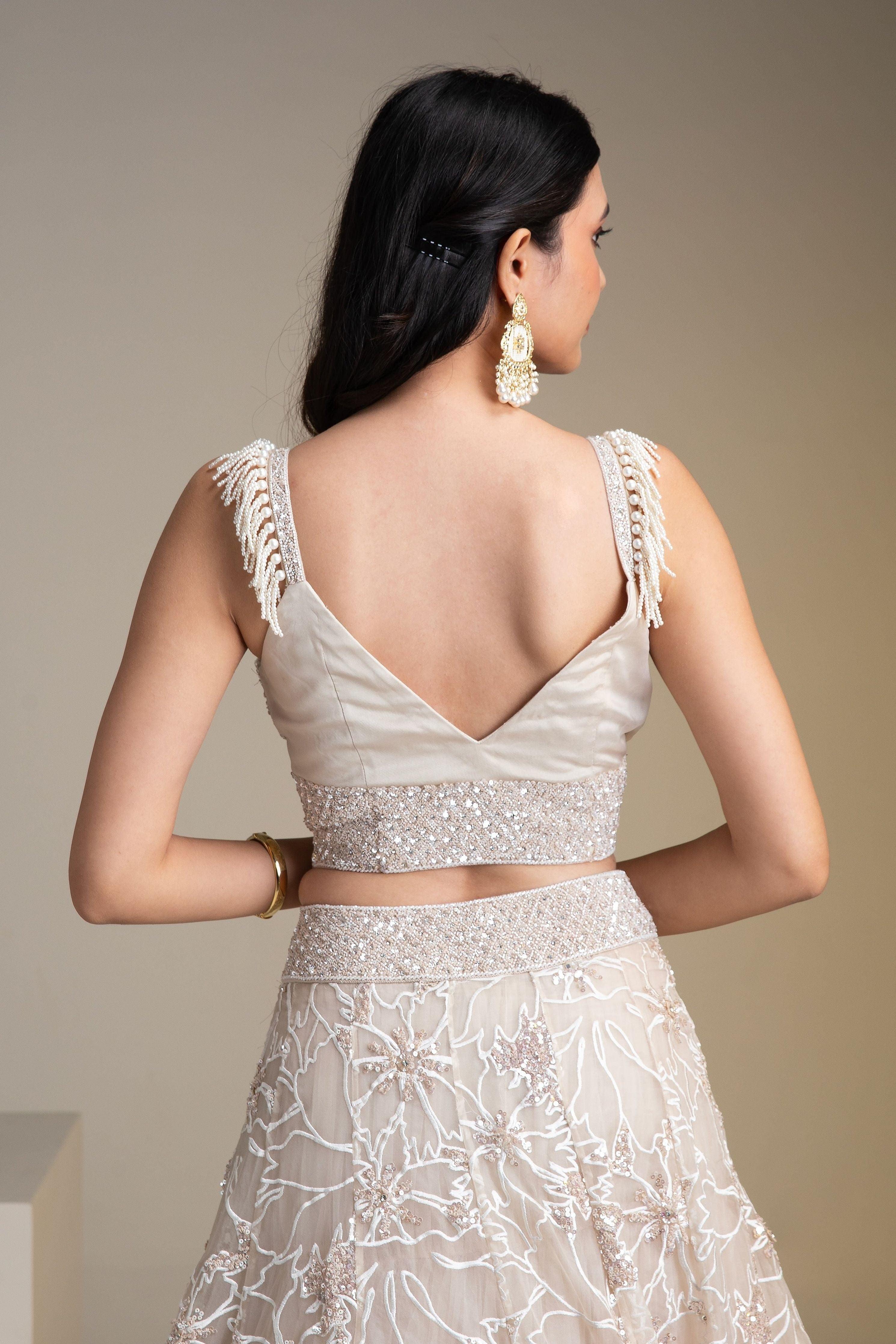 Ivory Organza Lehenga Set With Floral Embroidery And Sequins - Mokshaa
