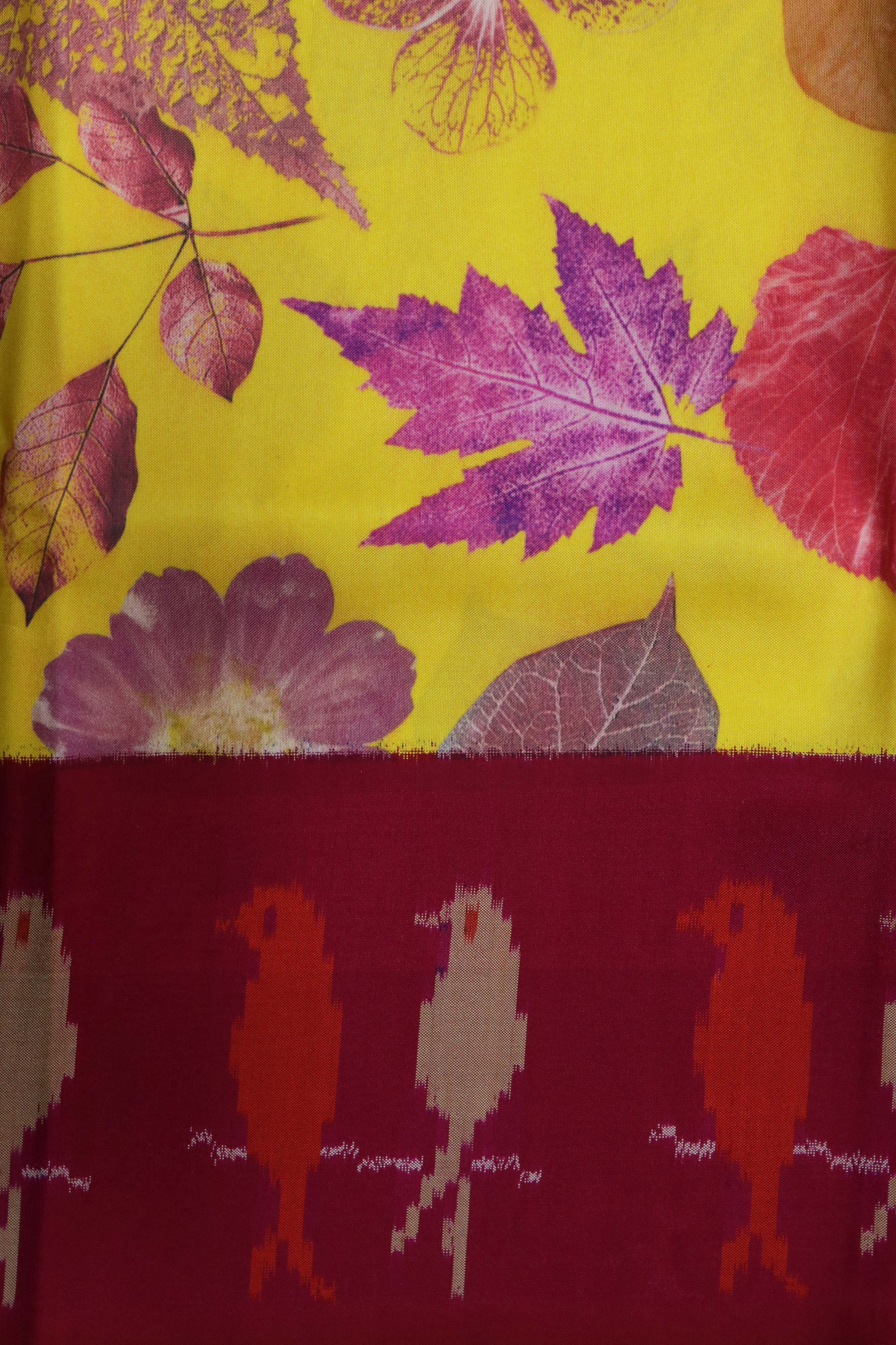 Yellow Printed Silk Saree with Ikat Border