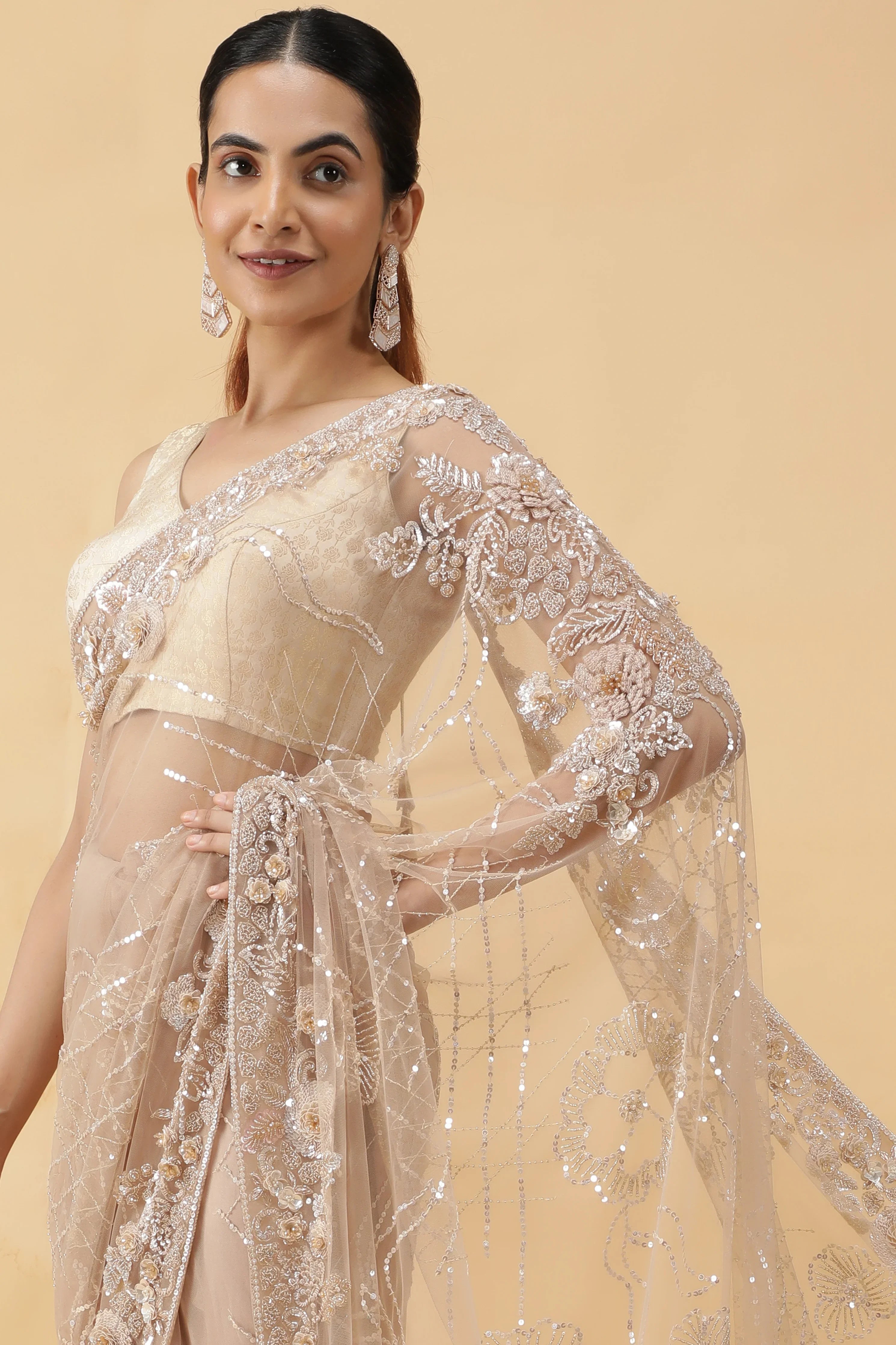 Beige Net Saree with All Over Sequins Work - Mokshaa