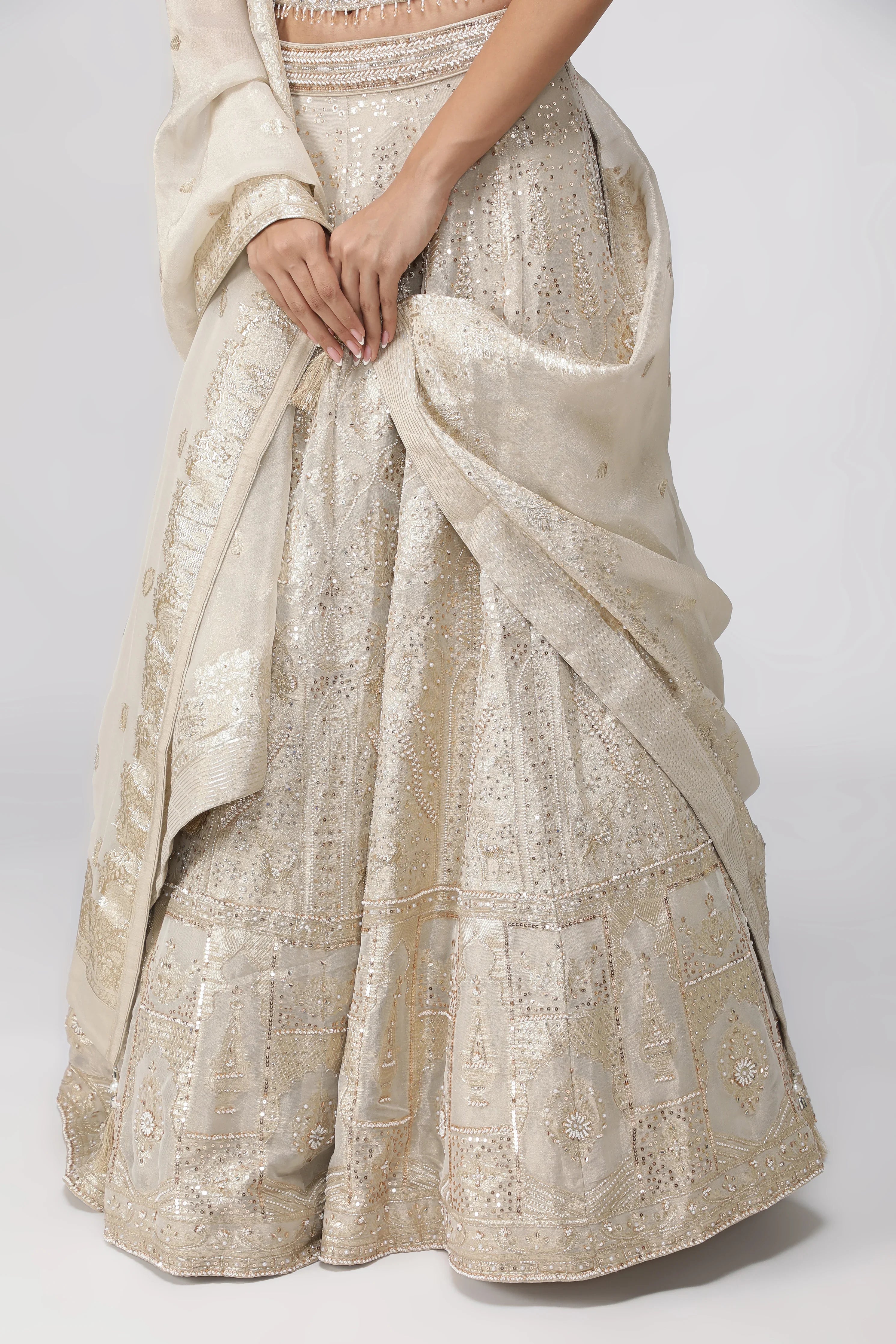 Ivory Banarasi Tissue Lehenga with Pearl Embellished Corset Blouse - Mokshaa
