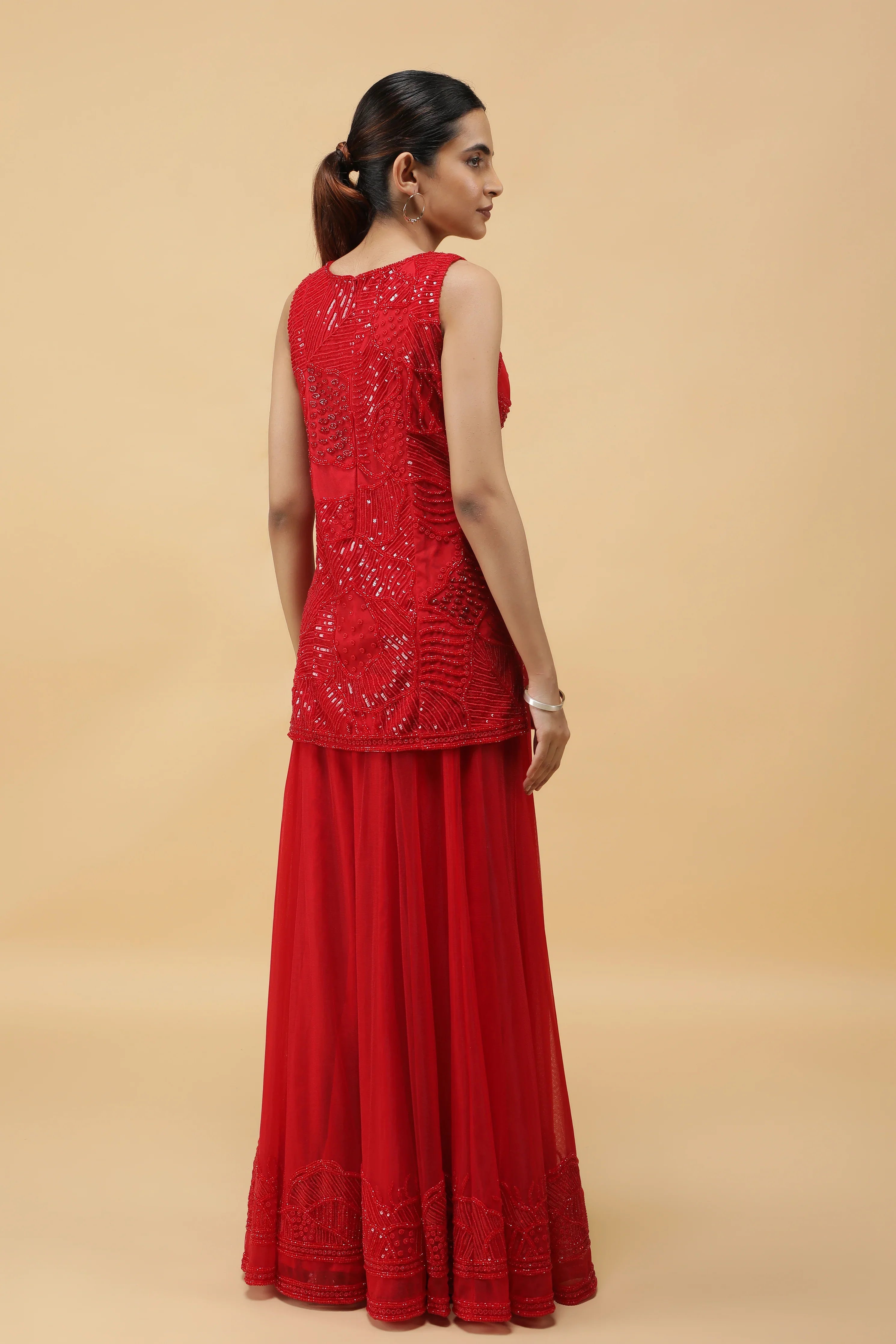 Elegant Red Net Sharara Set with Sequins, Kutdana & Pearl Embroidery - Mokshaa