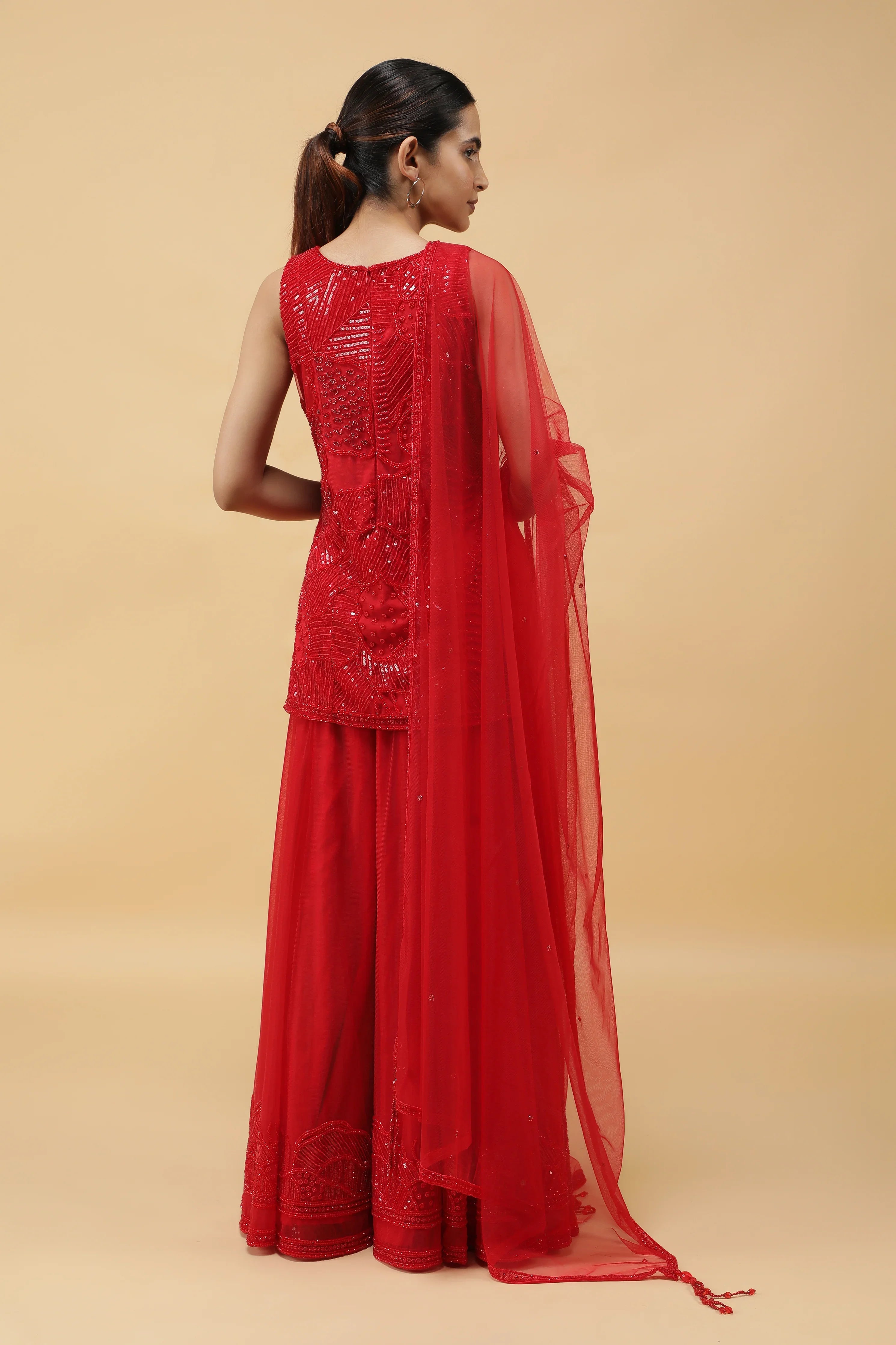 Elegant Red Net Sharara Set with Sequins, Kutdana & Pearl Embroidery - Mokshaa