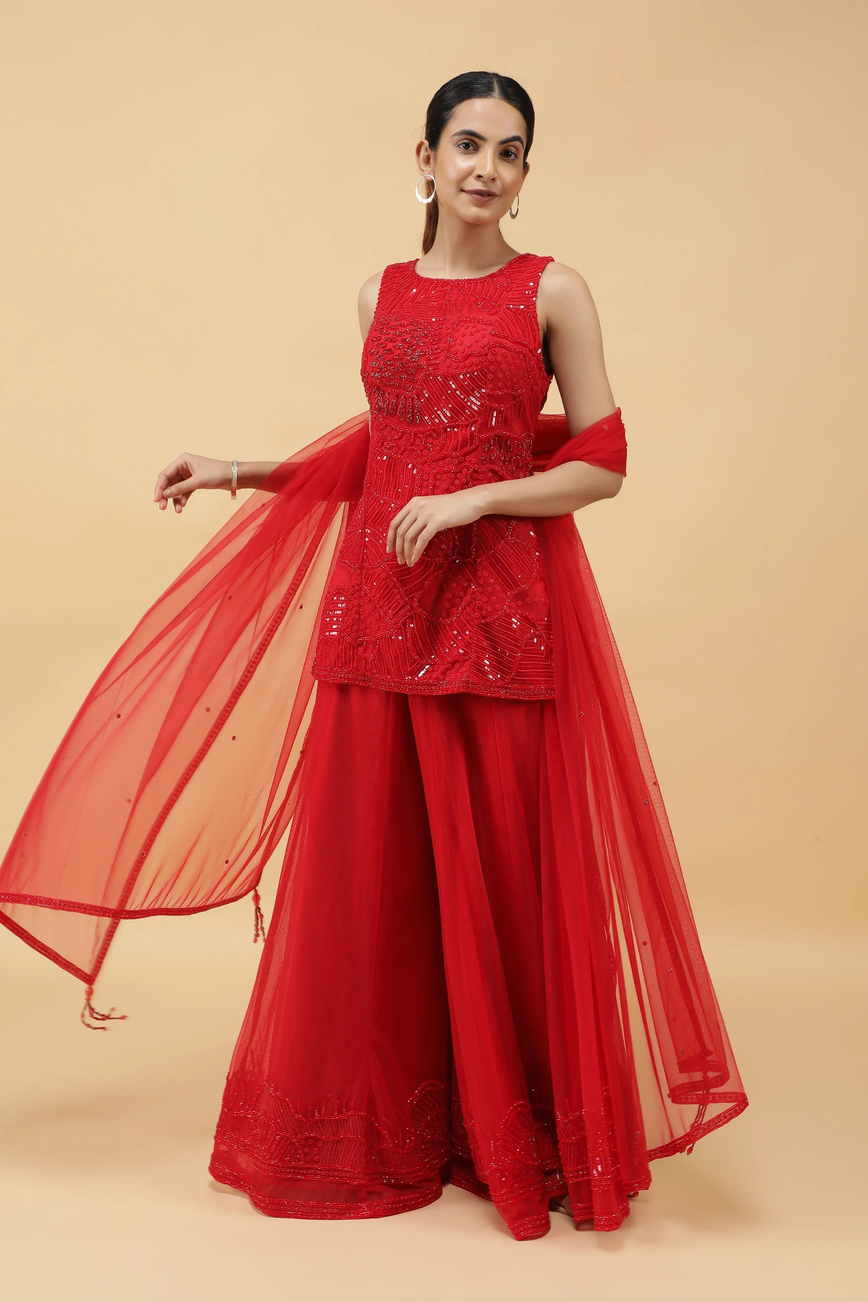 Elegant Red Net Sharara Set with Sequins, Kutdana & Pearl Embroidery - Mokshaa