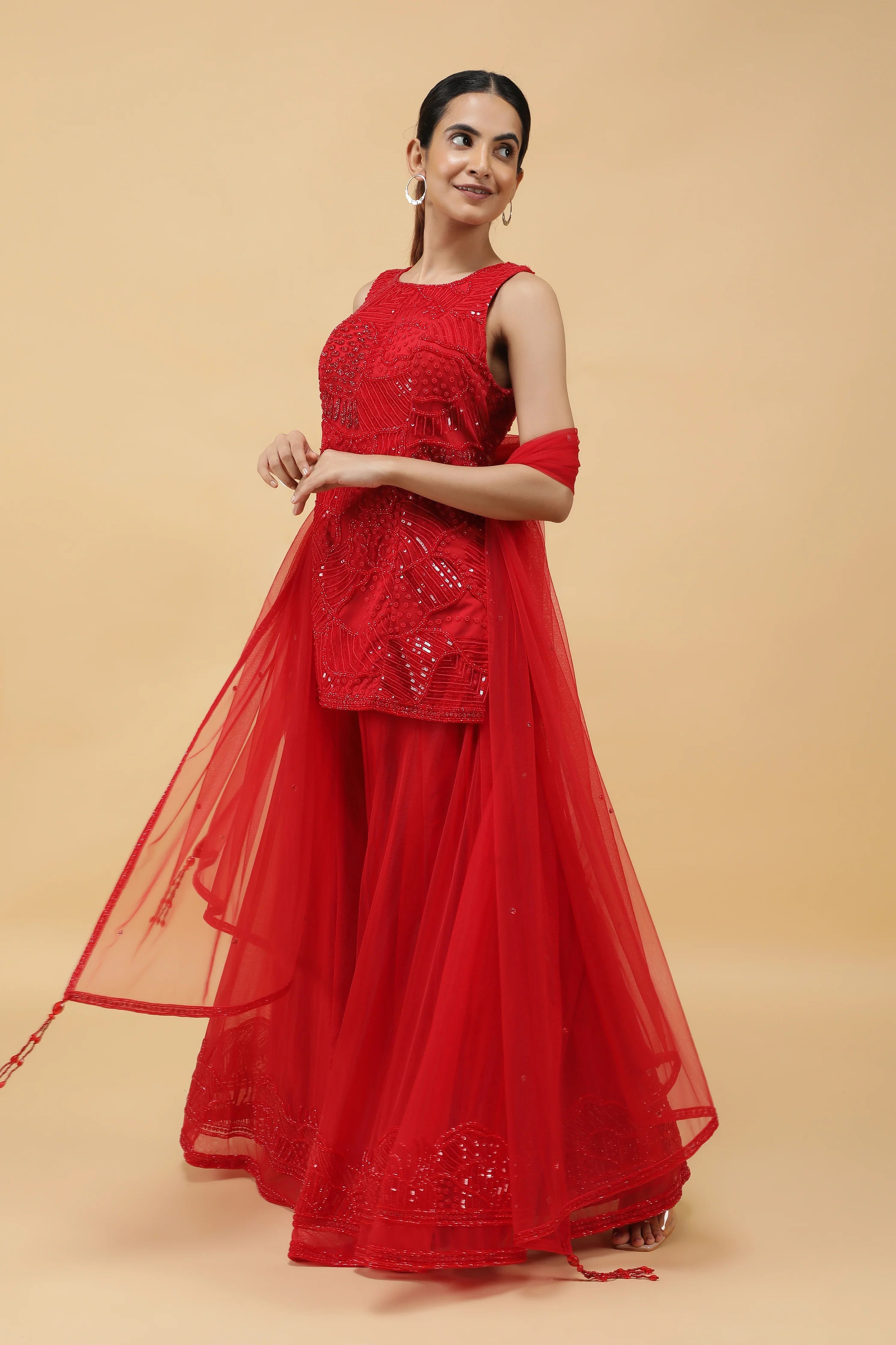Elegant Red Net Sharara Set with Sequins, Kutdana & Pearl Embroidery - Mokshaa