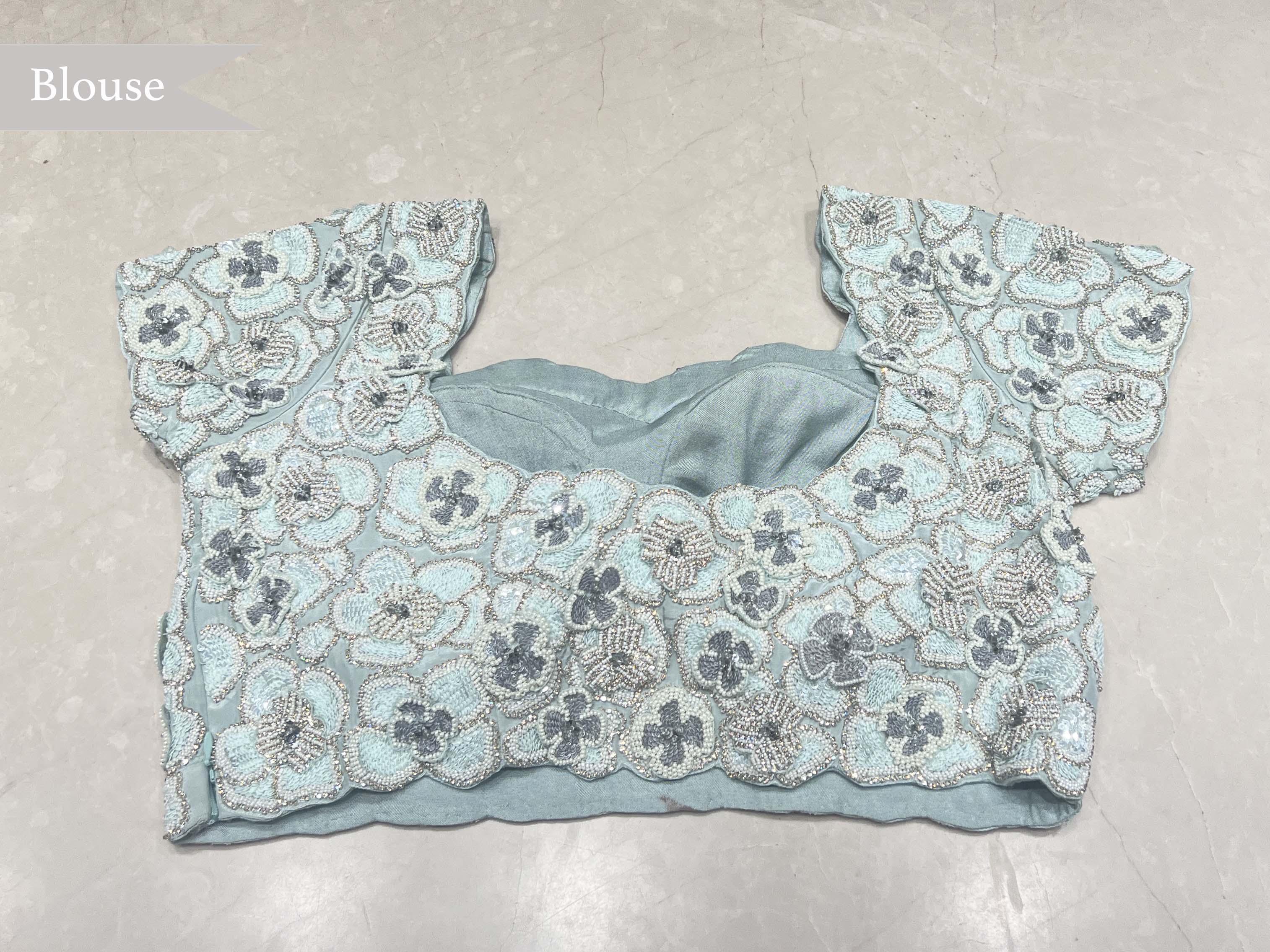 Sea Blue Organza Saree with Pearl & Sequin Border - Mokshaa