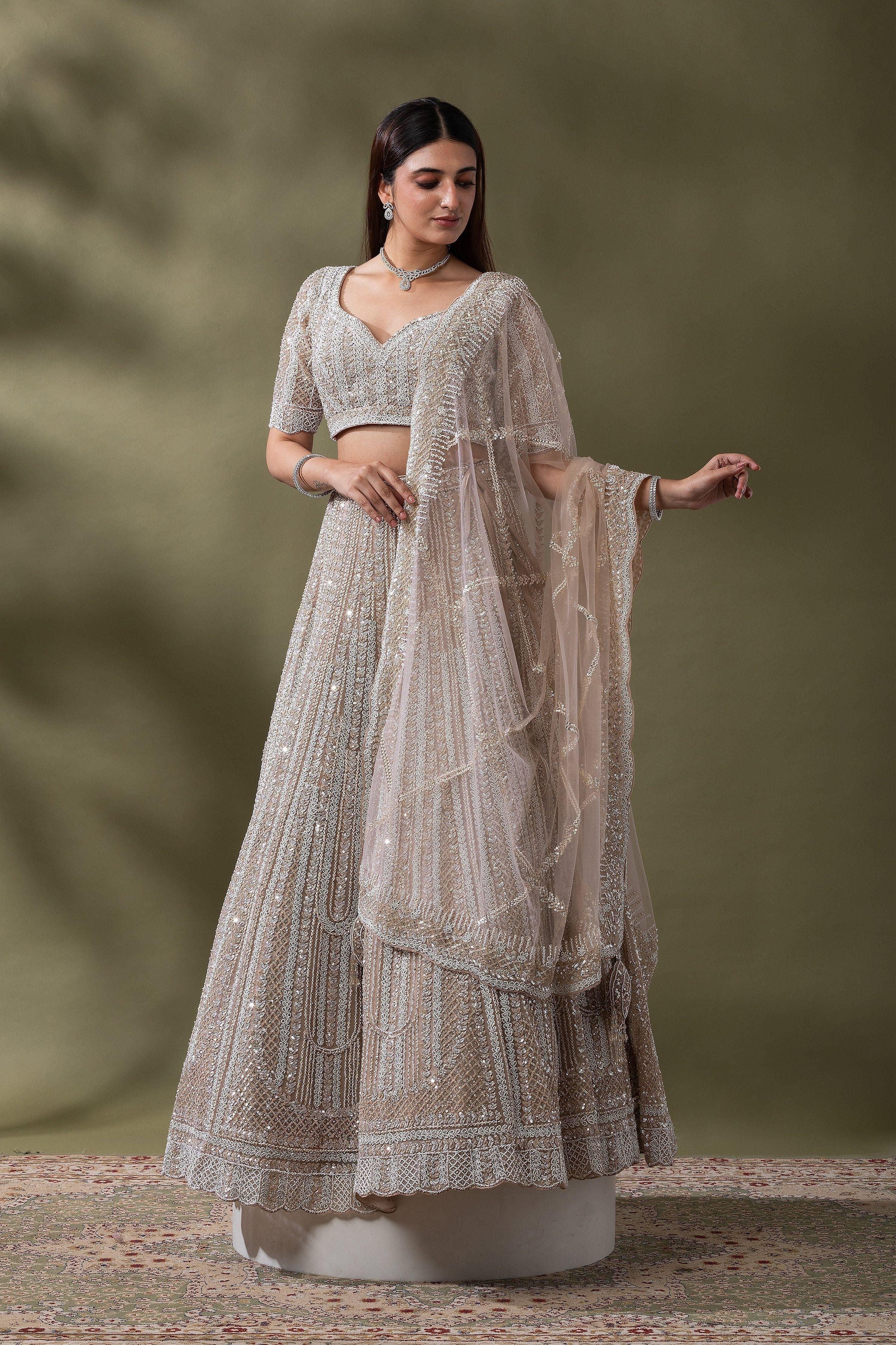 Ivory Sequined Embroidered Lehenga Set - Mokshaa