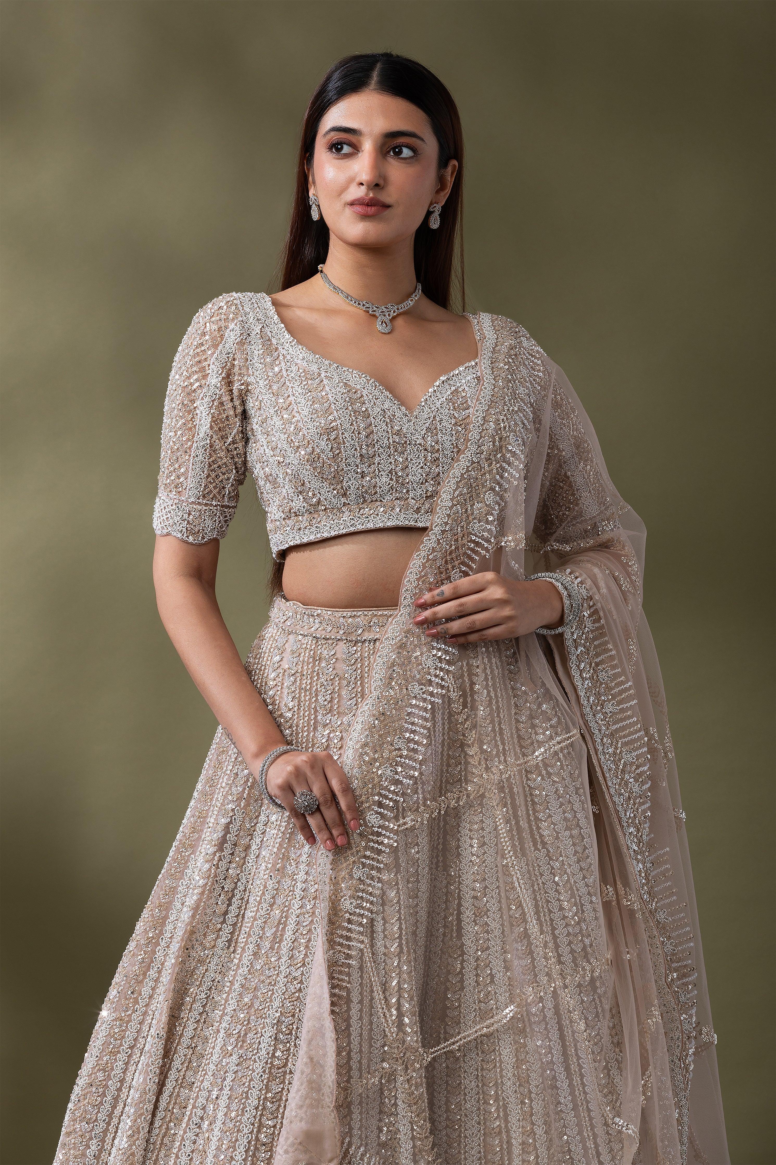 Ivory Sequined Embroidered Lehenga Set - Mokshaa