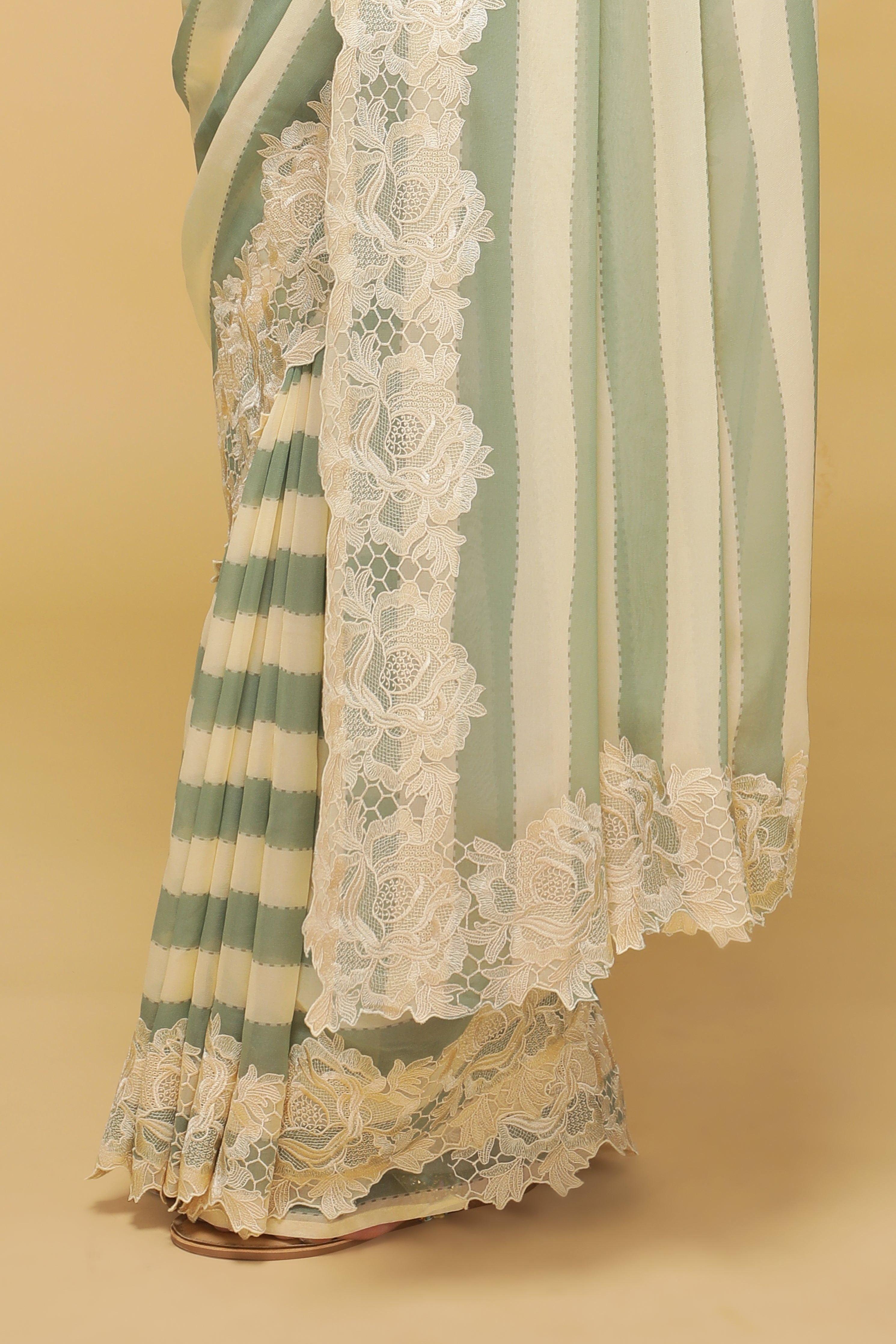 Green & Off-White Striped Georgette Saree with Thread Lace Border - Mokshaa