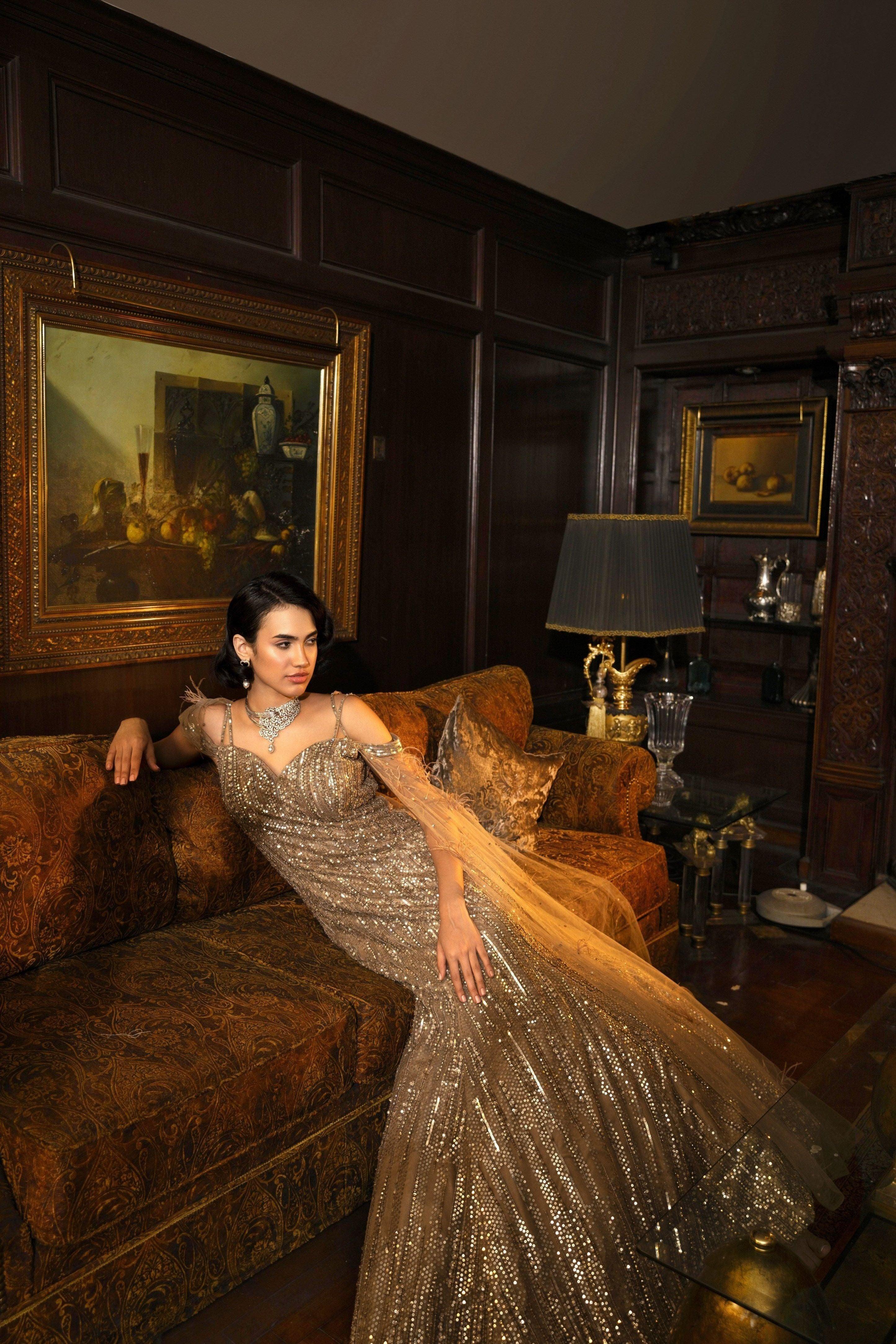 Golden Brown Mermaid-Cut Gown With Cape Sleeves - Mokshaa