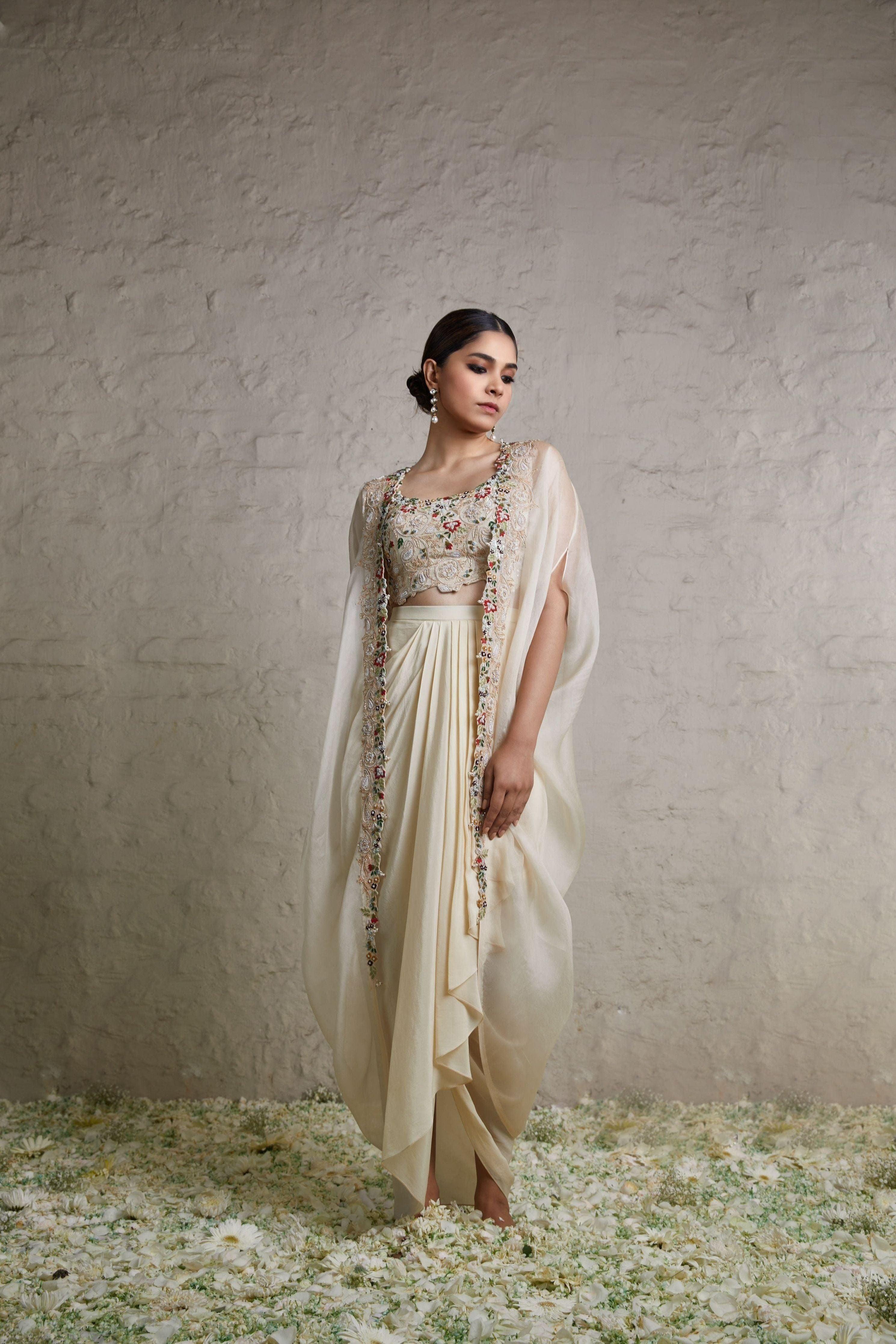 Ivory Silk Blouse With Crepe Dhoti And Organza Cape - Mokshaa