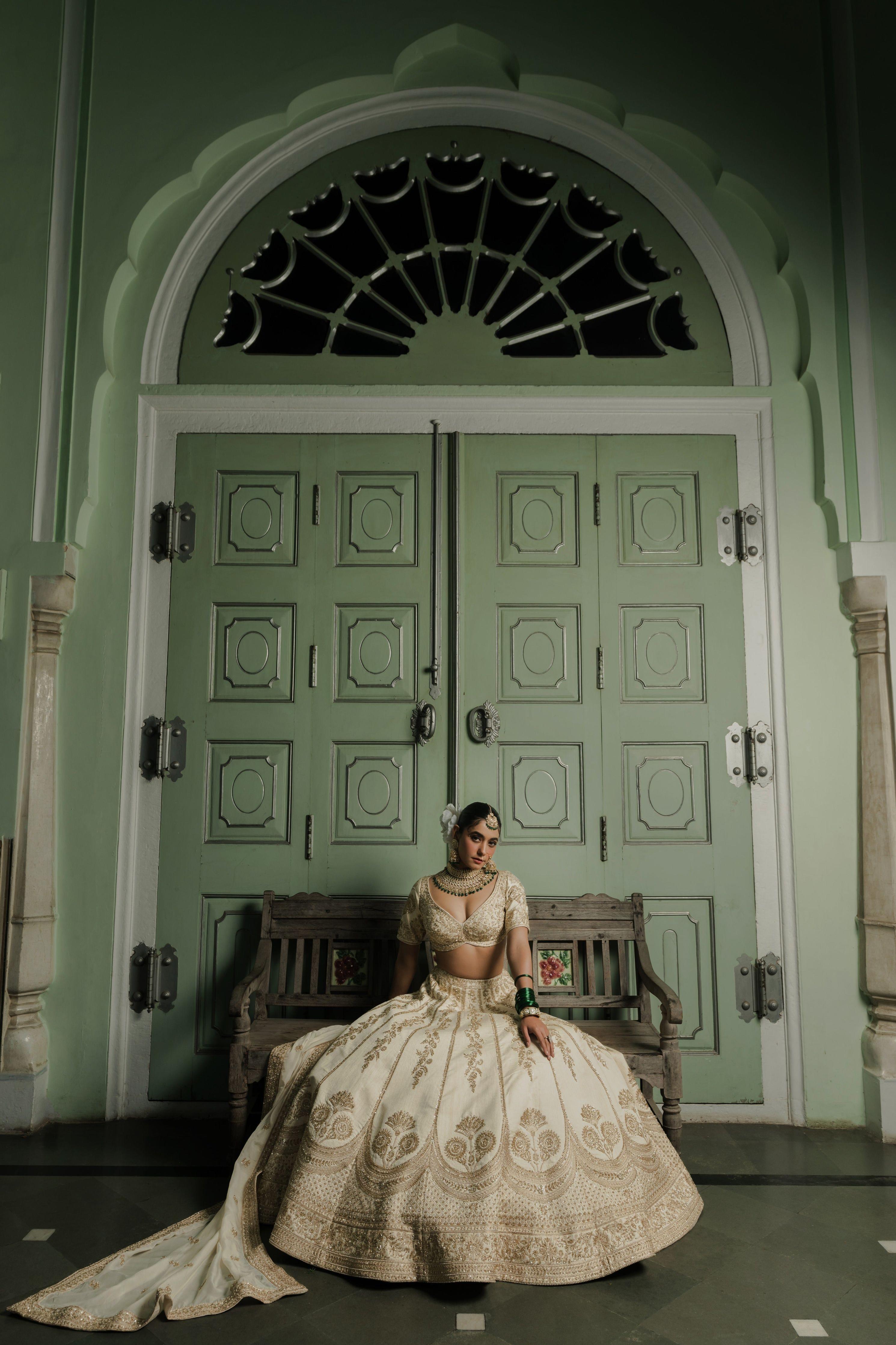 Ivory Raw Silk Lehenga with Antique Zardosi Embroidery - Mokshaa
