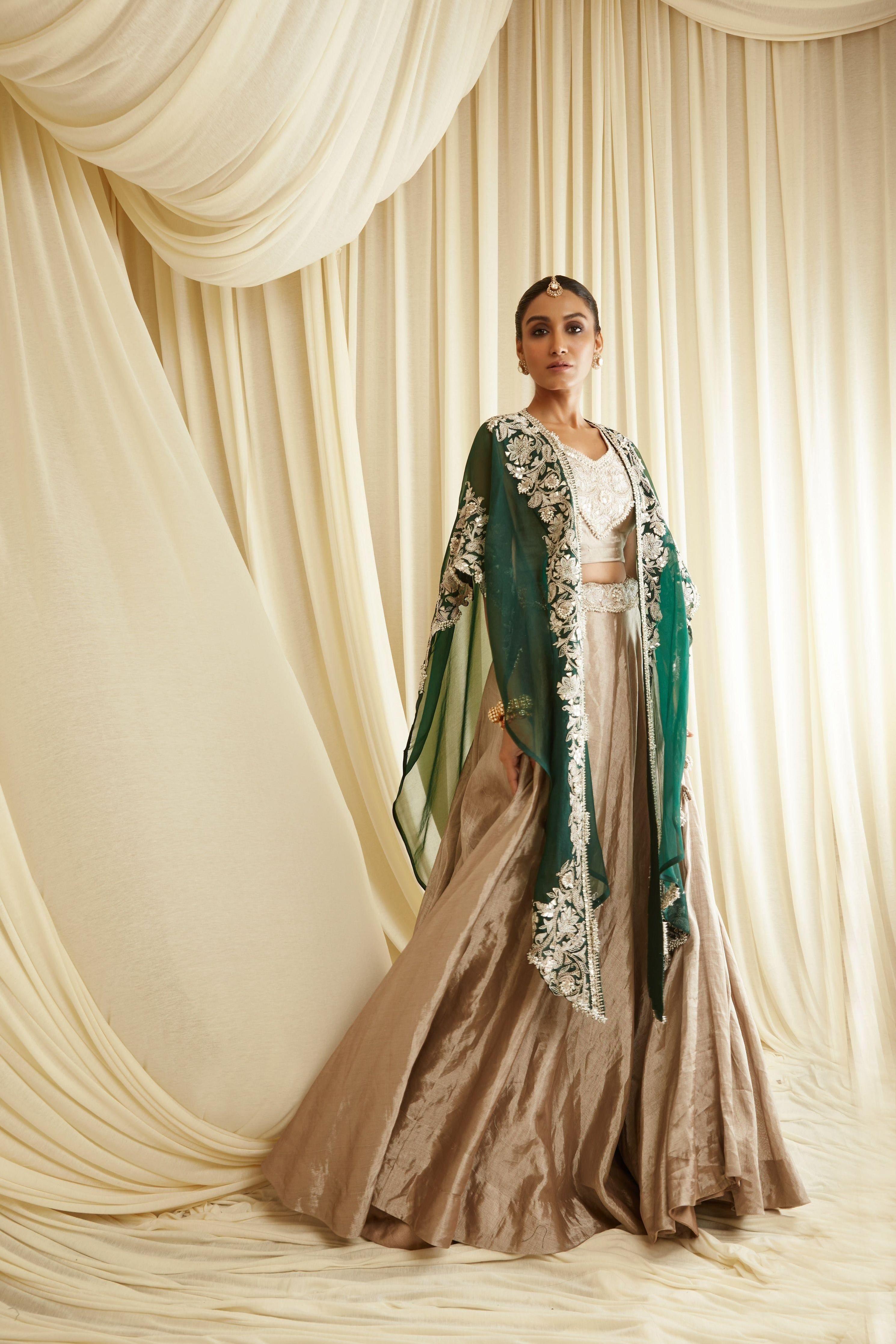 Bottle Green Cape And Champagne Blouse And Skirt - Mokshaa