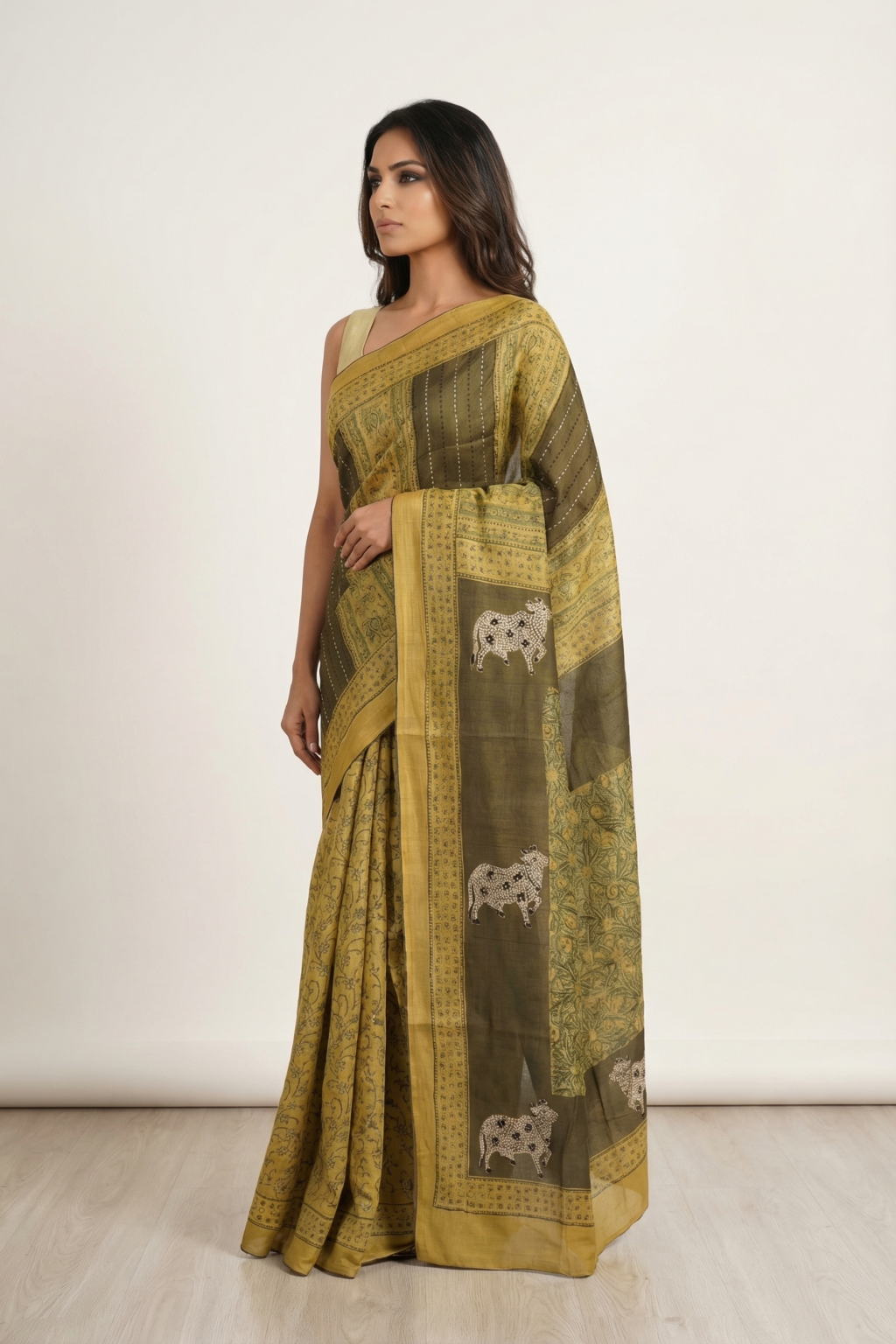 Mustard Tussar Silk Saree with Ajrakh Print & Cow Motif Border