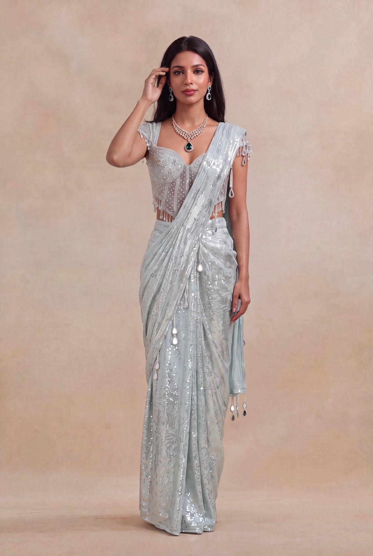 Ice Blue Net Drape Saree with Embellished Corset Blouse - Mokshaa