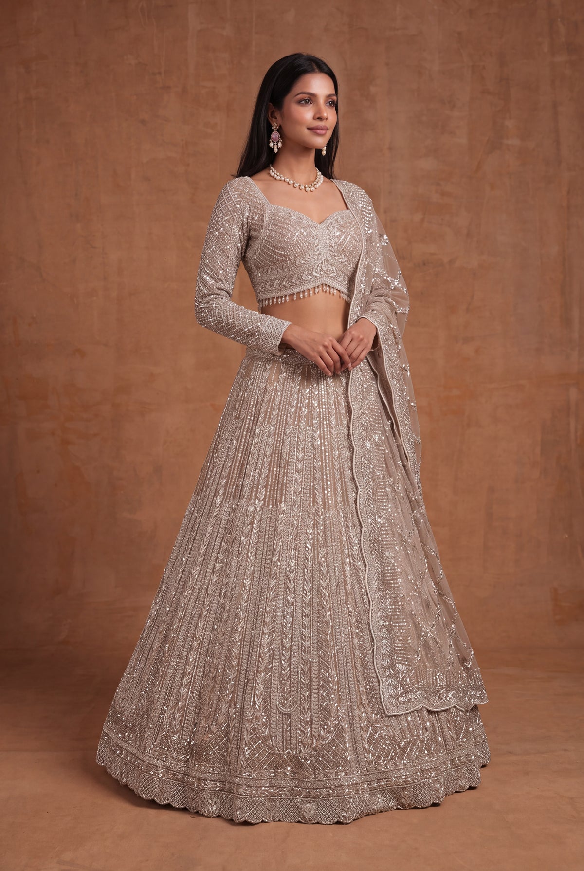 Champagne Net Lehenga - Mokshaa