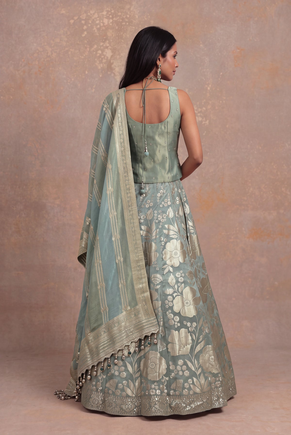 Sage Green Banarasi Tissue Silk Lehenga with Embellished Blouse - Mokshaa