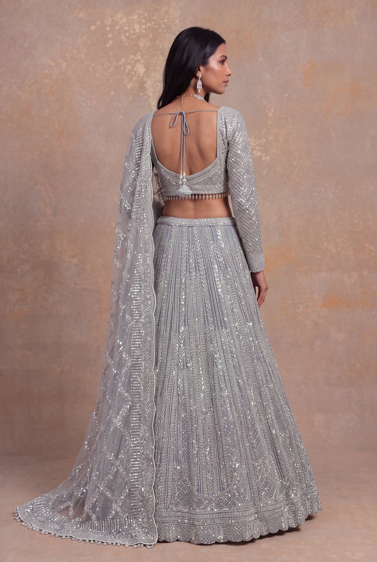 Ice Blue Net Sequin & Stone Embellished Lehenga Set - Mokshaa