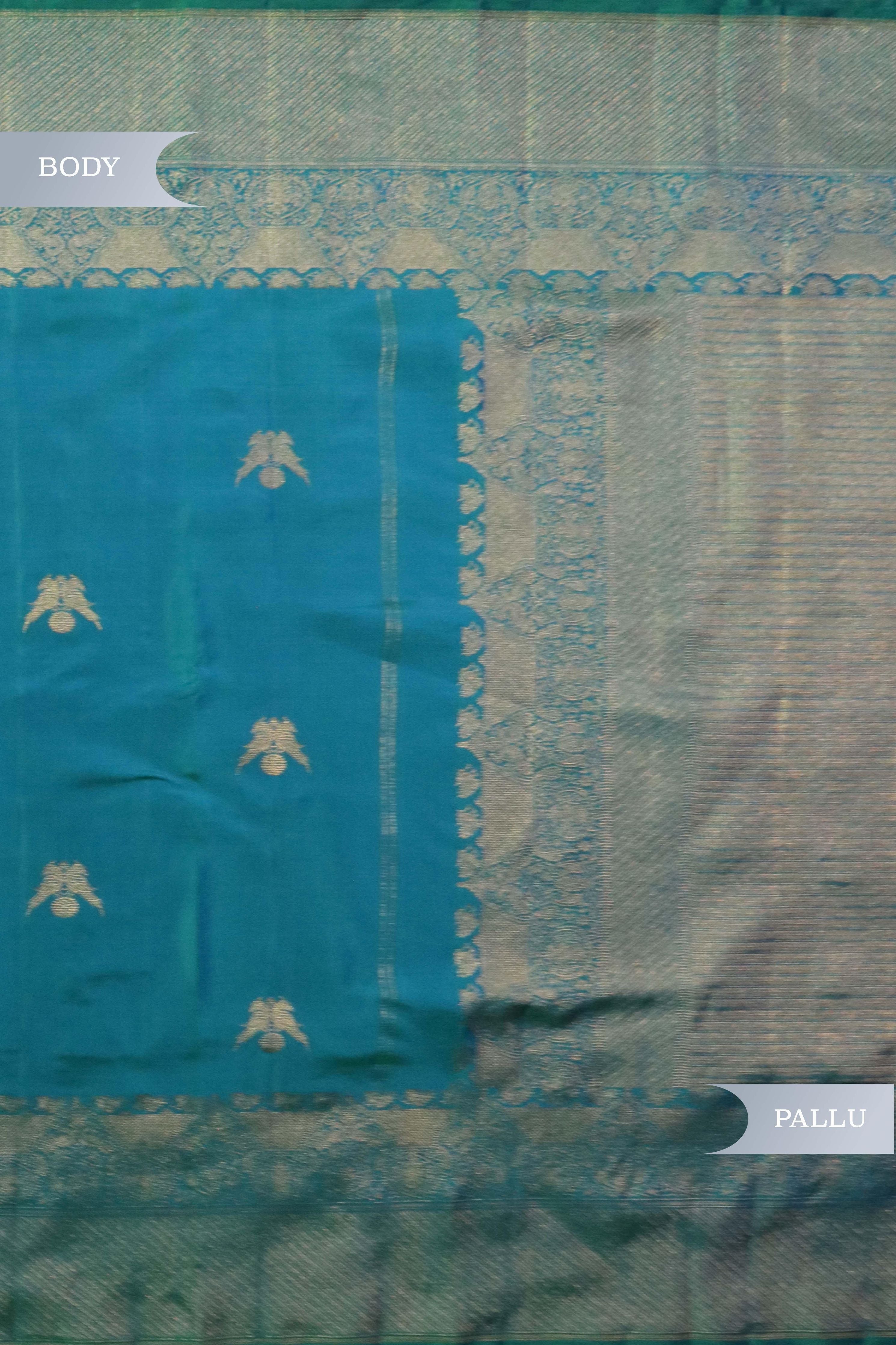 Turquoise Blue Kanchivaram Silk Saree with Fancy Zari Butta - Mokshaa