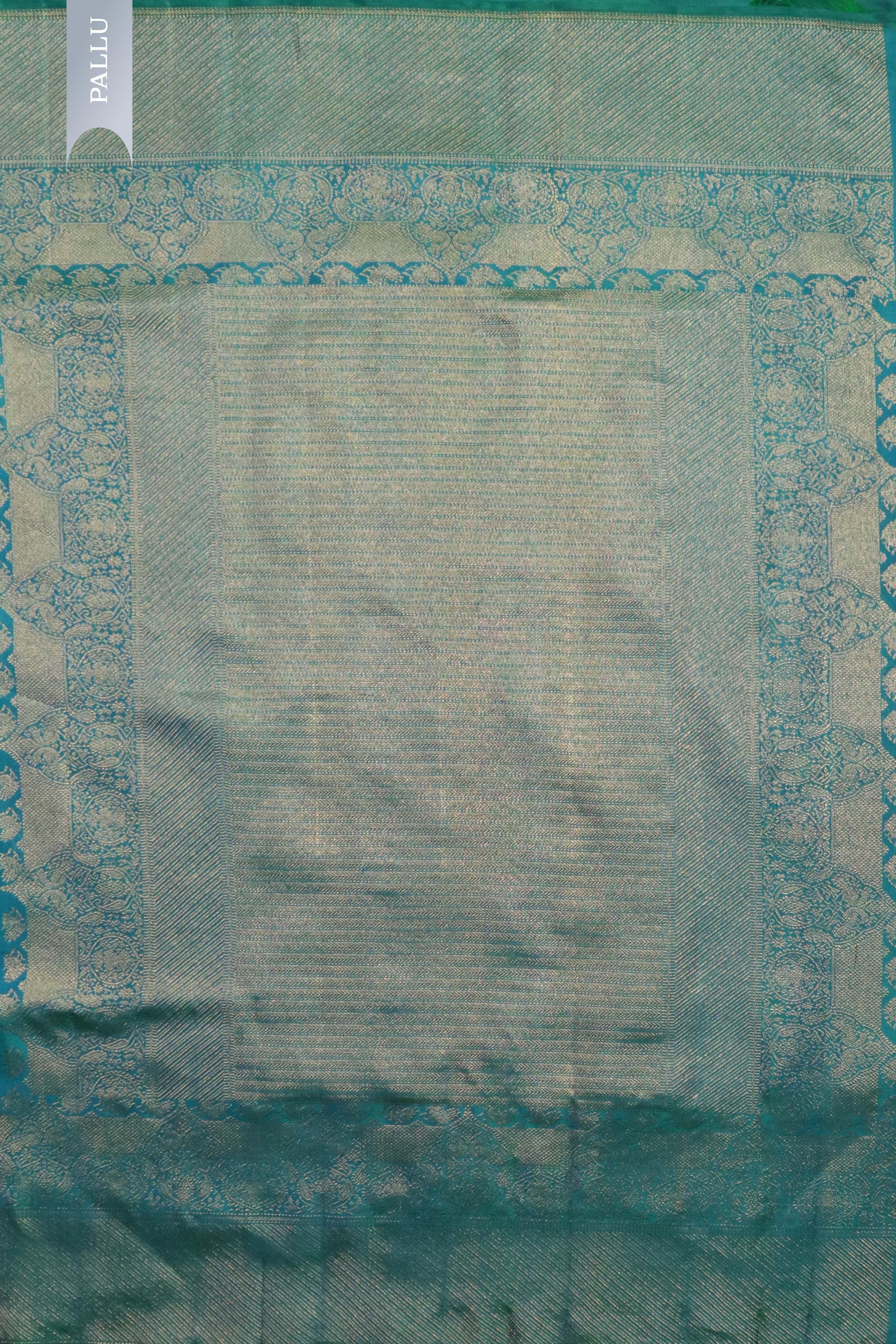 Turquoise Blue Kanchivaram Silk Saree with Fancy Zari Butta - Mokshaa
