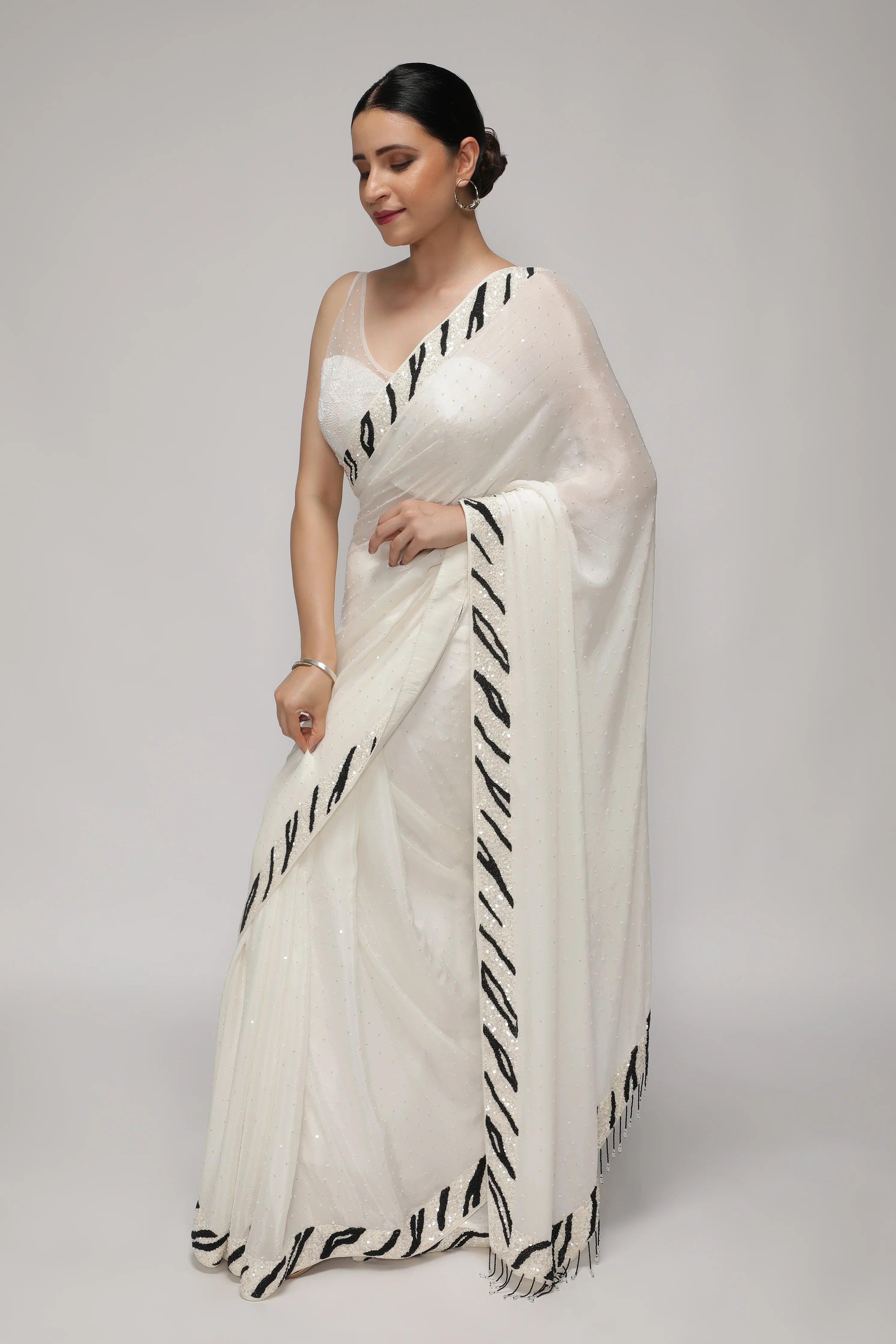 White Crepe Chiffon Saree with Sequins and Beaded Border - Mokshaa