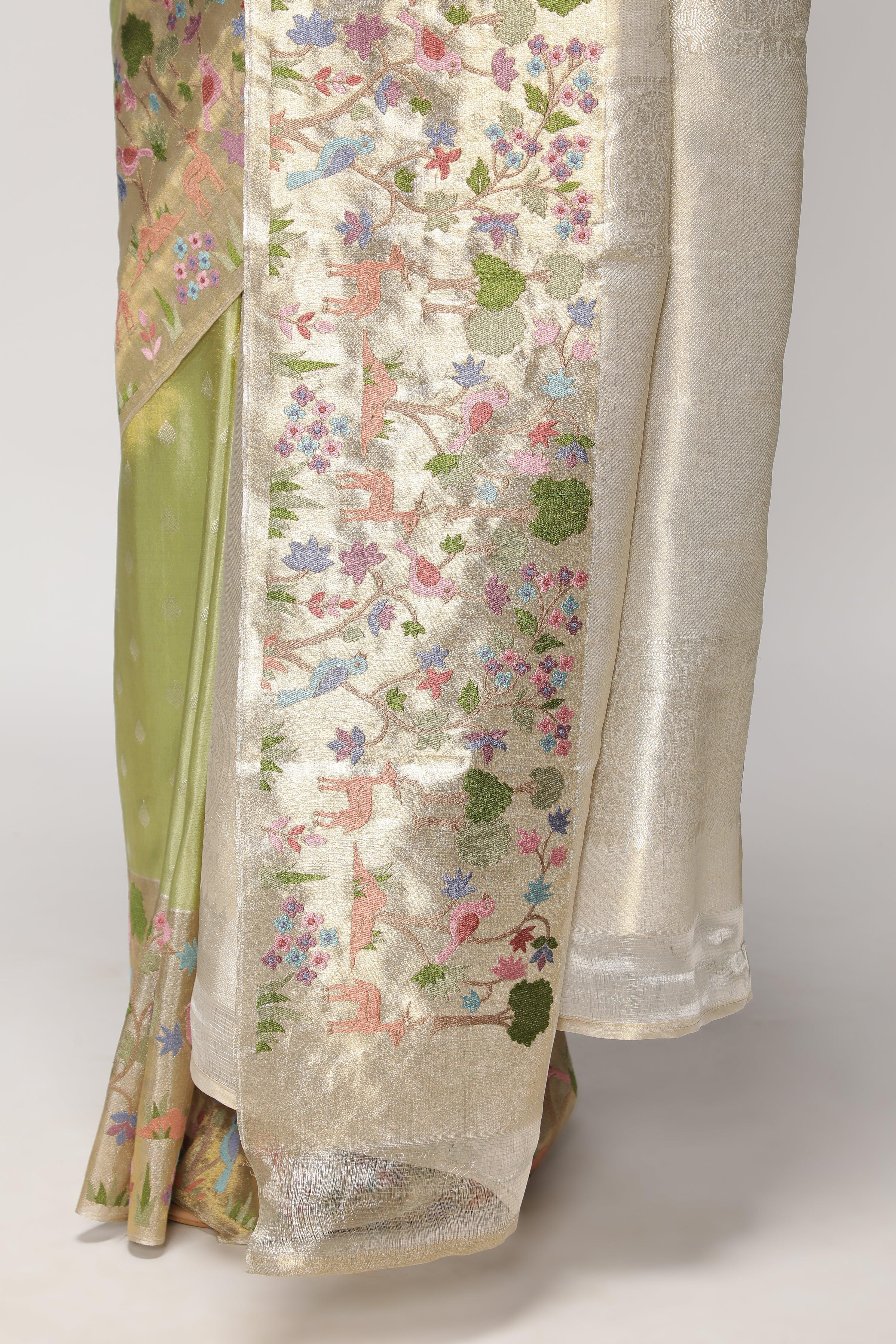 Green Kanchipuram Tissue Silk Saree with All-Over Zari Weaving and Contrast Embroidery Border - Mokshaa