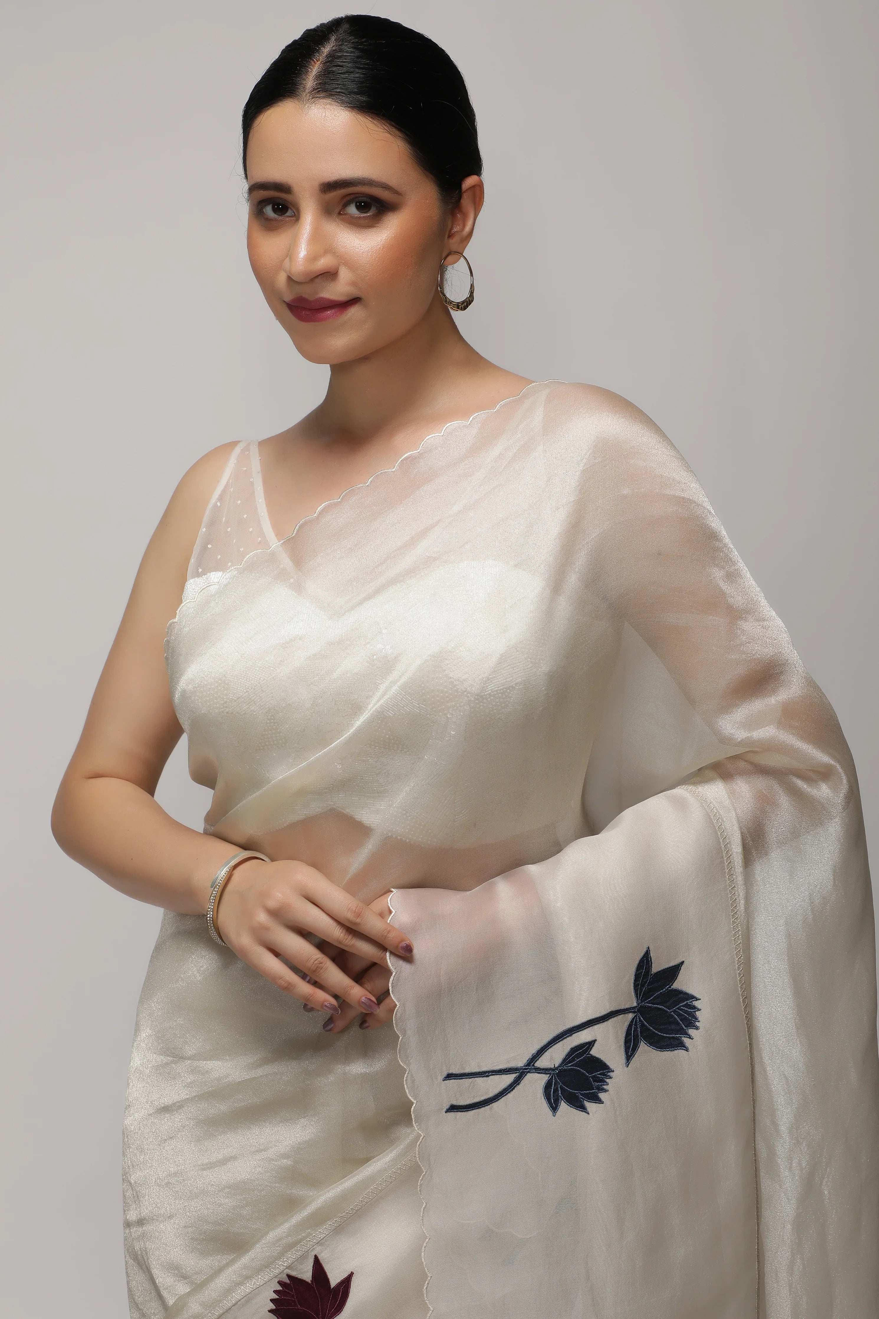 Silver White Tissue Saree with Multicolor Floral AppliquéKora Border - Mokshaa